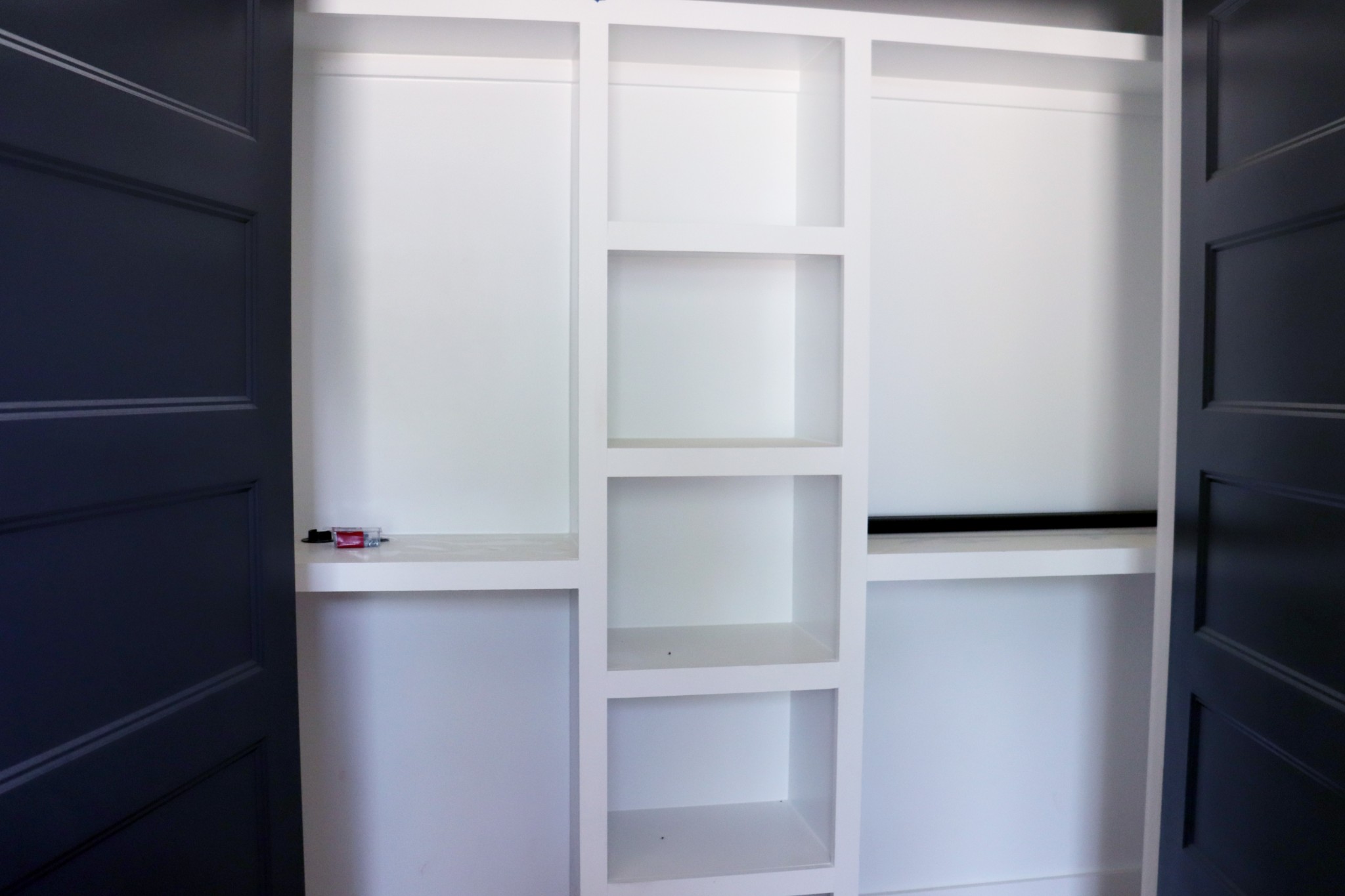 Bedroom 2 has custom built-ins in the closet.