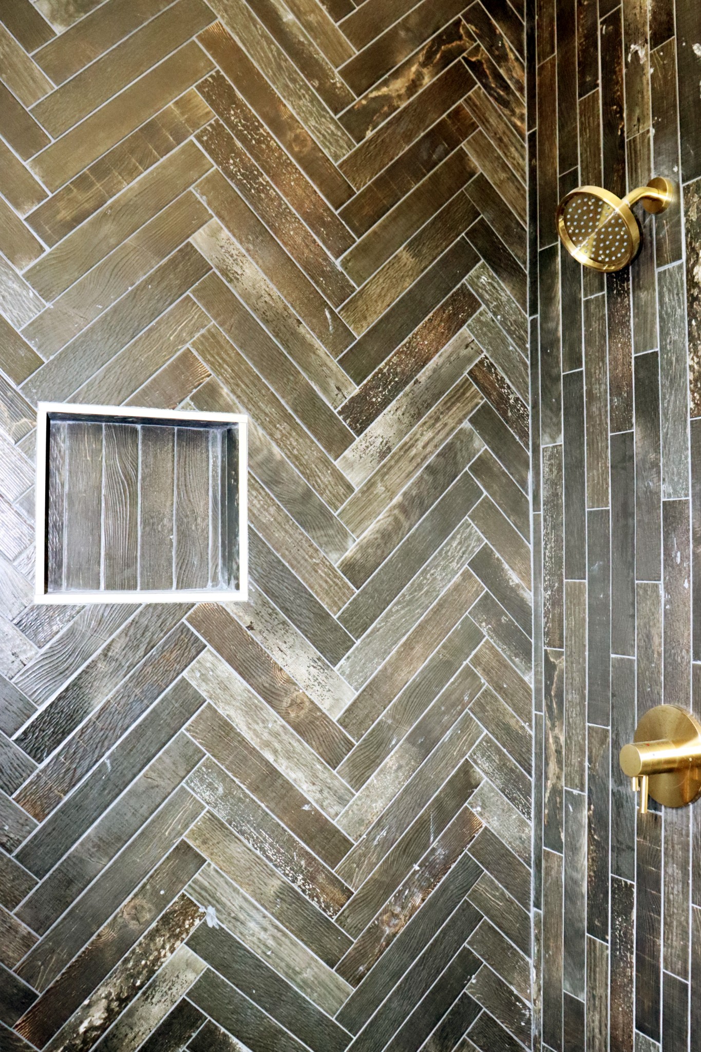 The Upstairs shower is beautifully designed.