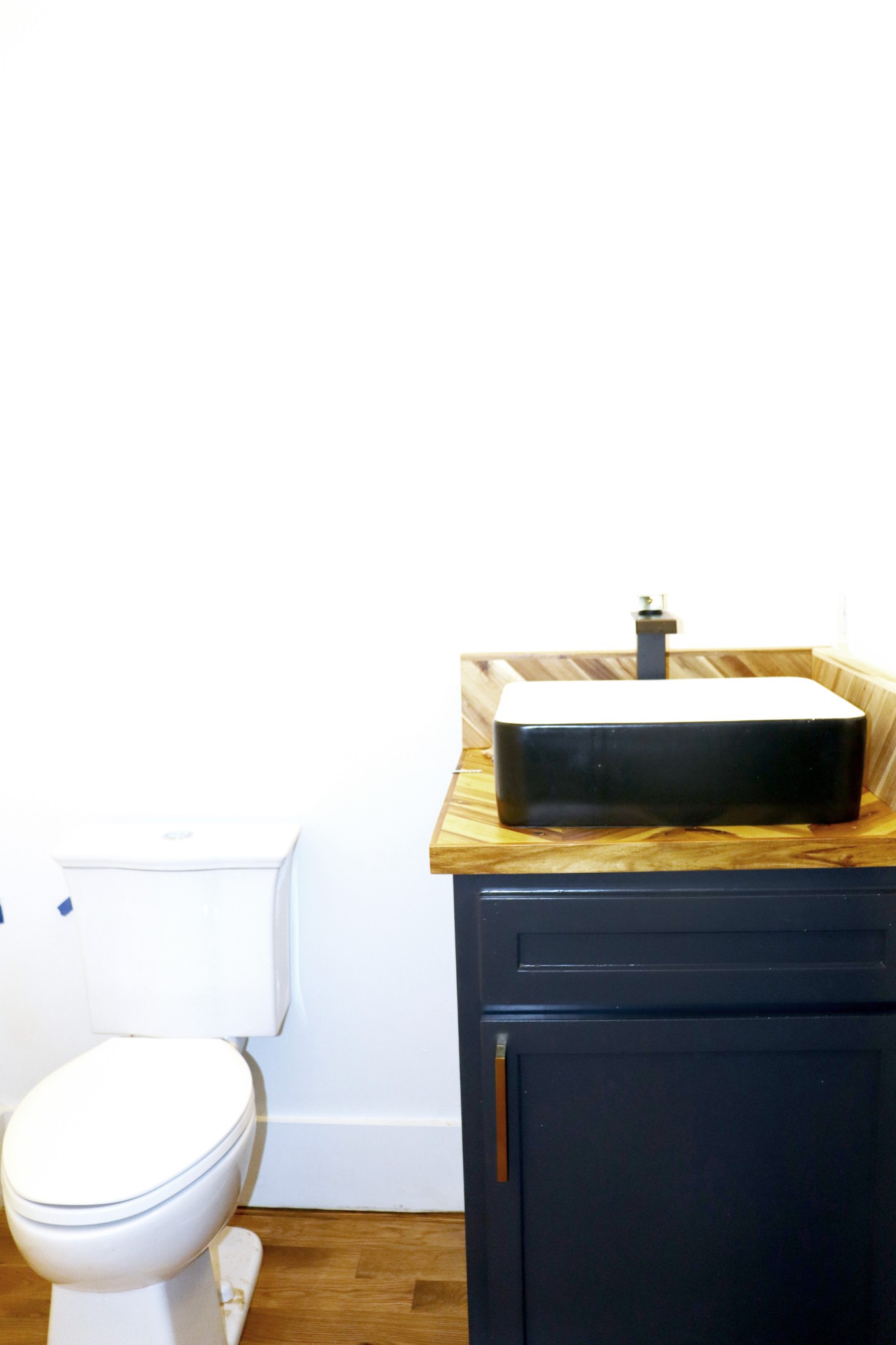 A Half bath for guests is conveniently located.