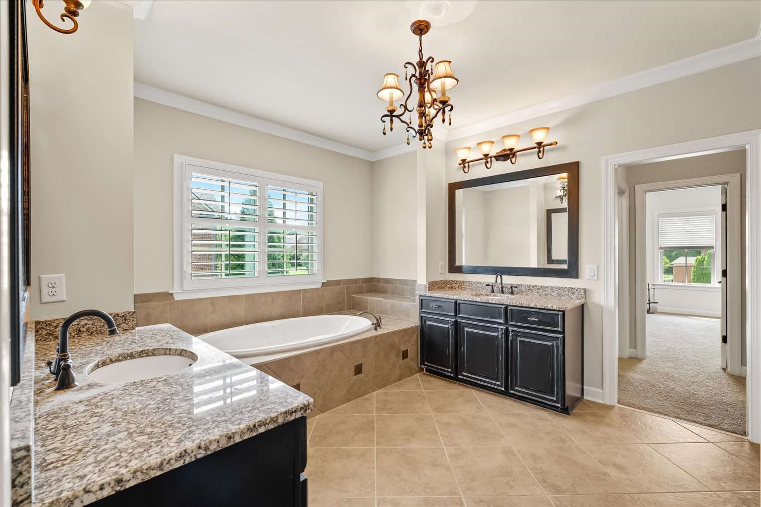 Large Primary Bath, separate tub and shower, lead to 2 huge closets!