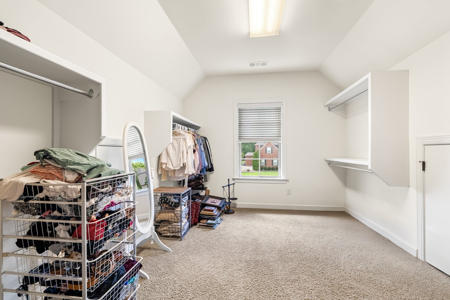 Huge Primary Closet 2. Access doors to more storage