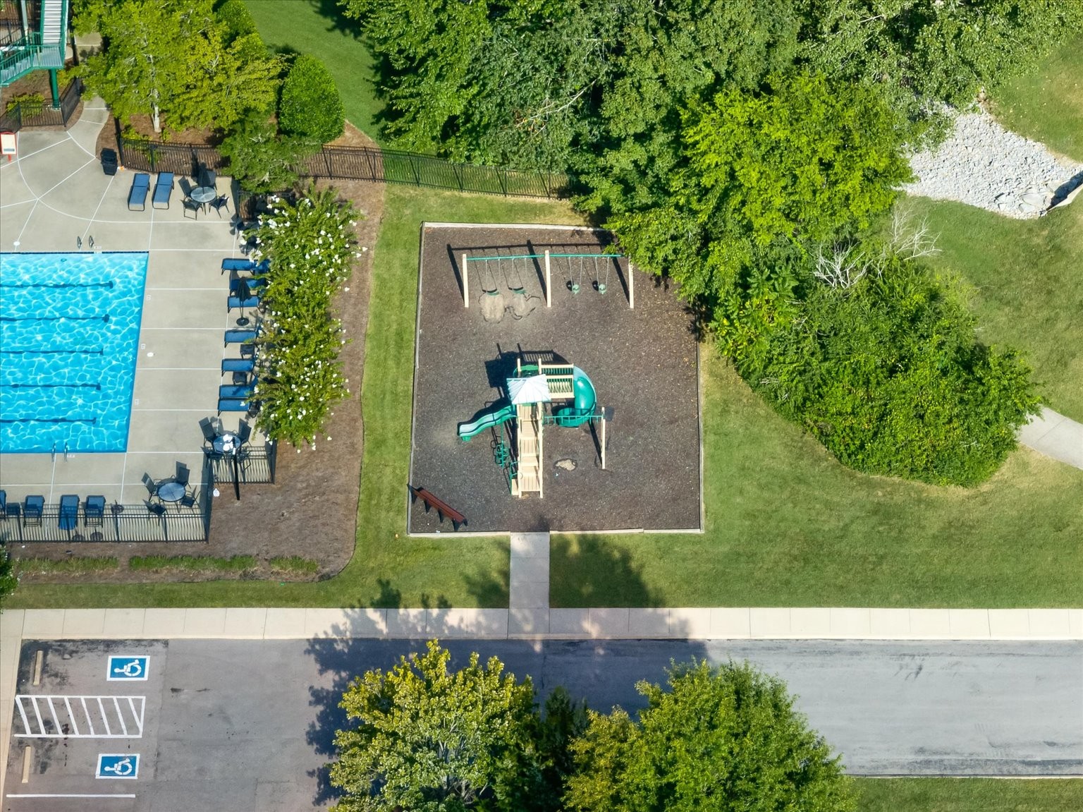 Right down the street, playground and pool