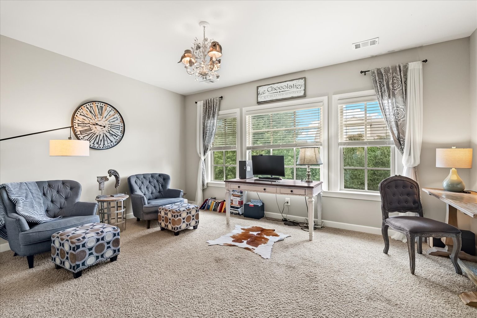 Bedroom right next to primary, huge space with a small closet, can be a bedroom , office or a bonus space.