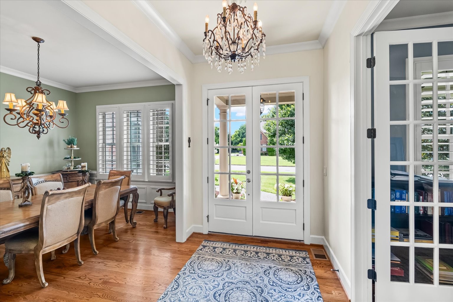 French doors lead to a lovely office space and a huge dining room