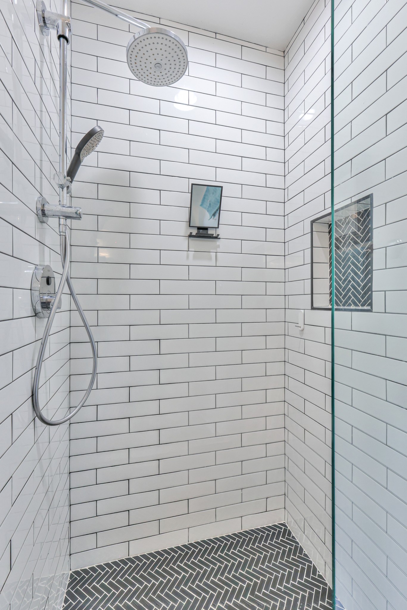 Designer shower in secondary bathroom on main floor