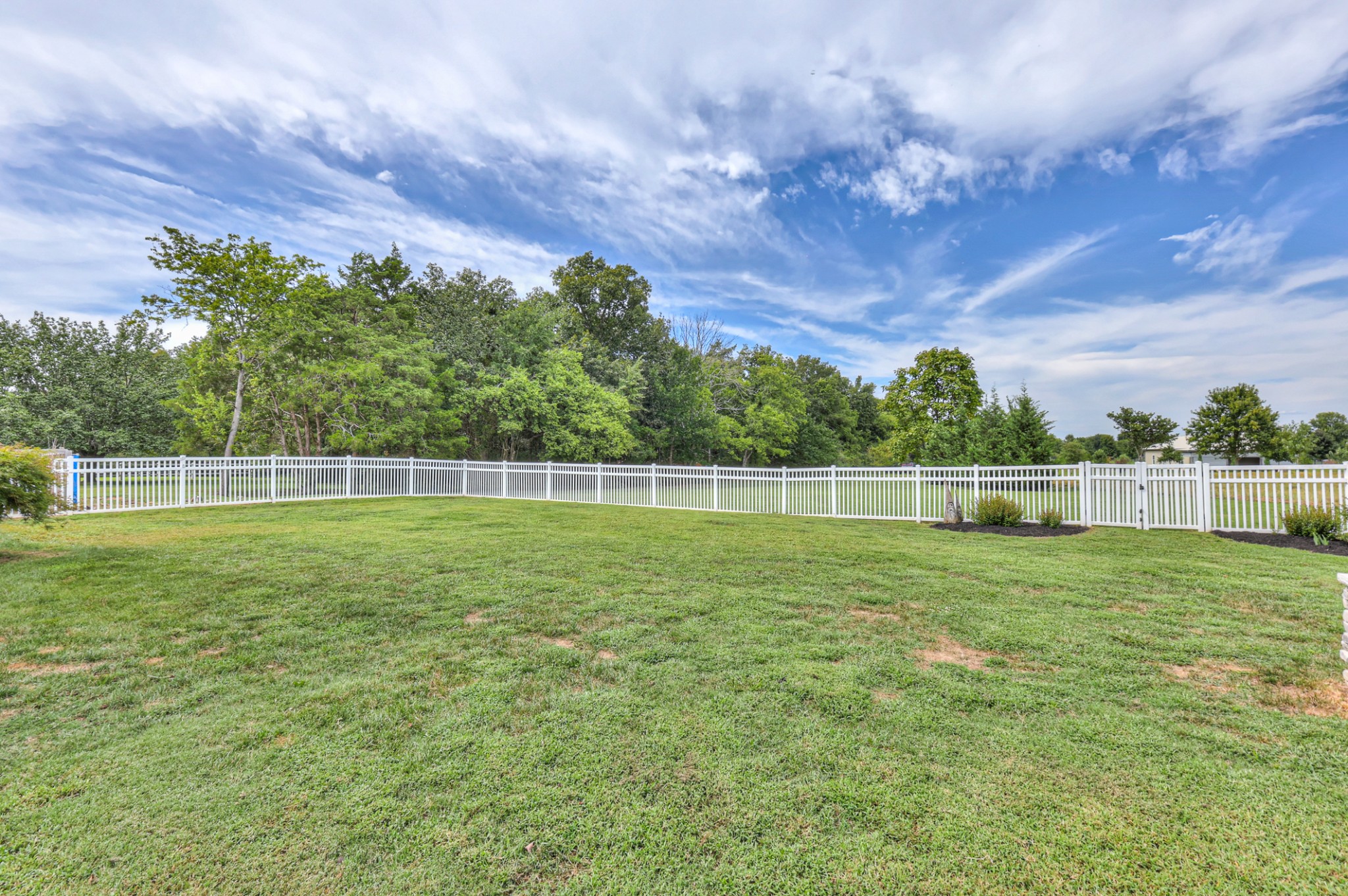 This is the view from the back patio. Shooting range is to the center on the other side of the fence