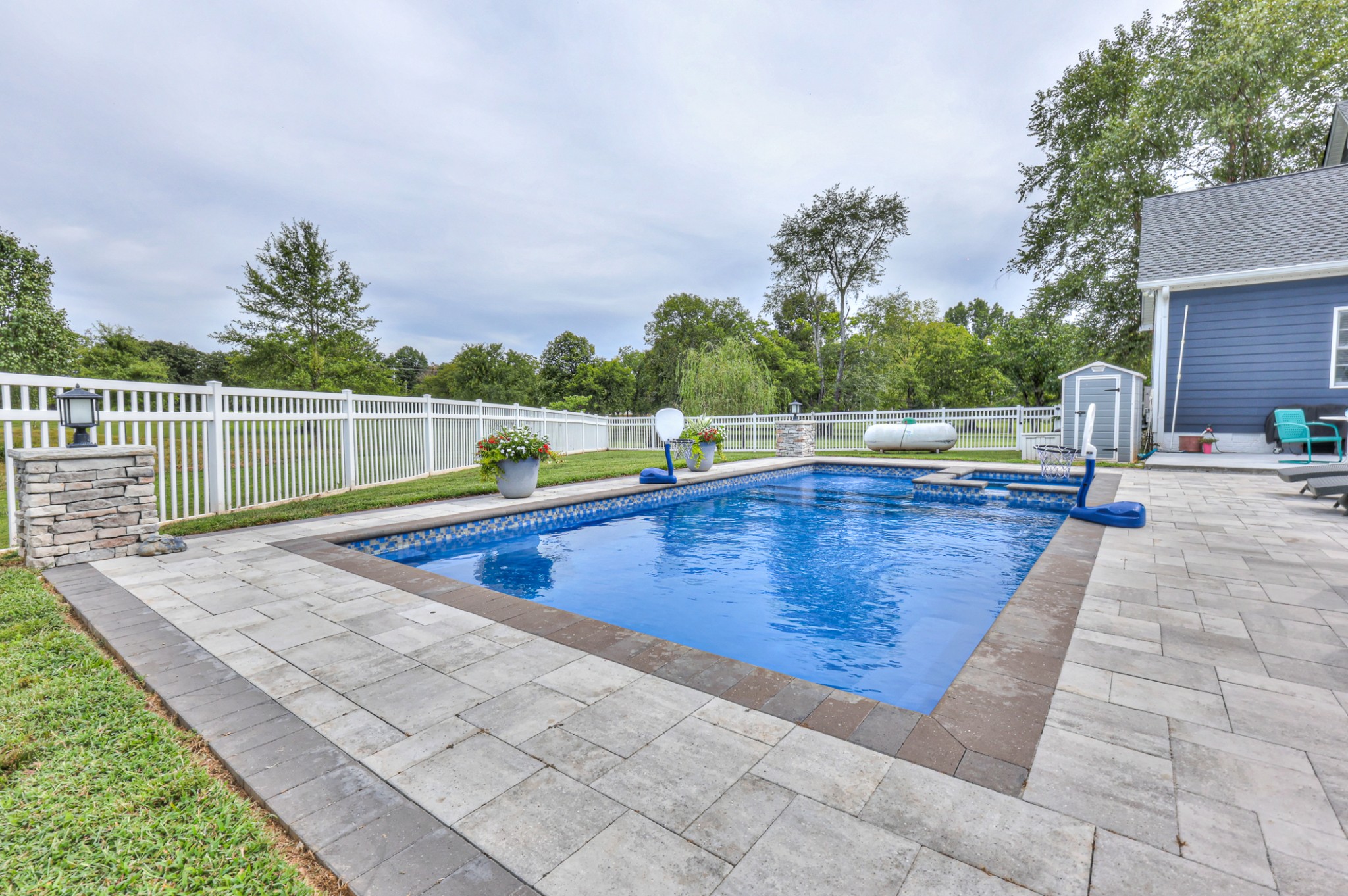 Who wouldn't want this pool with built in hot tub and tanning shelf.