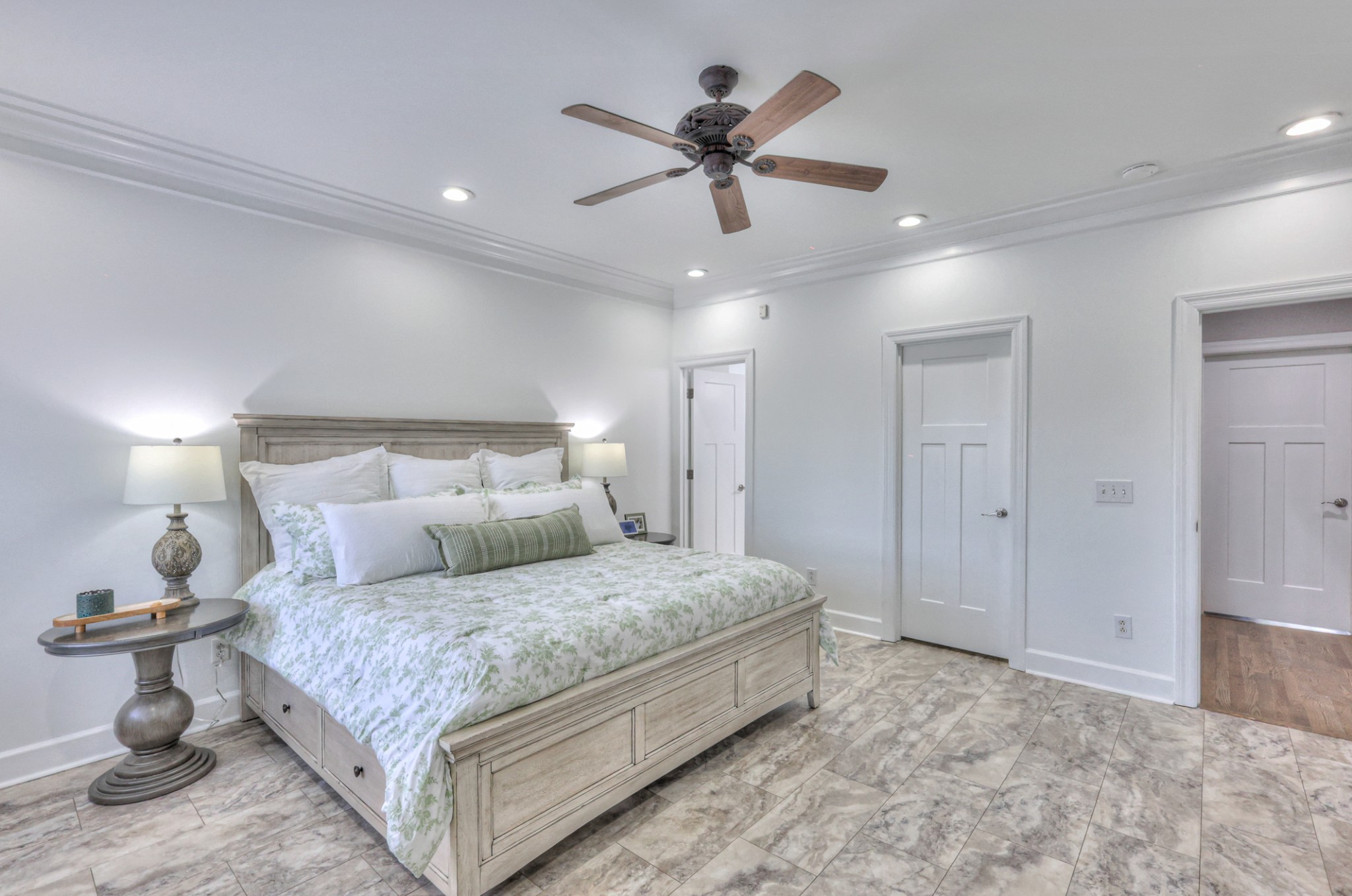 Middle door is the "his" walk in closet. Door on the left leads to a spa-like master bathroom