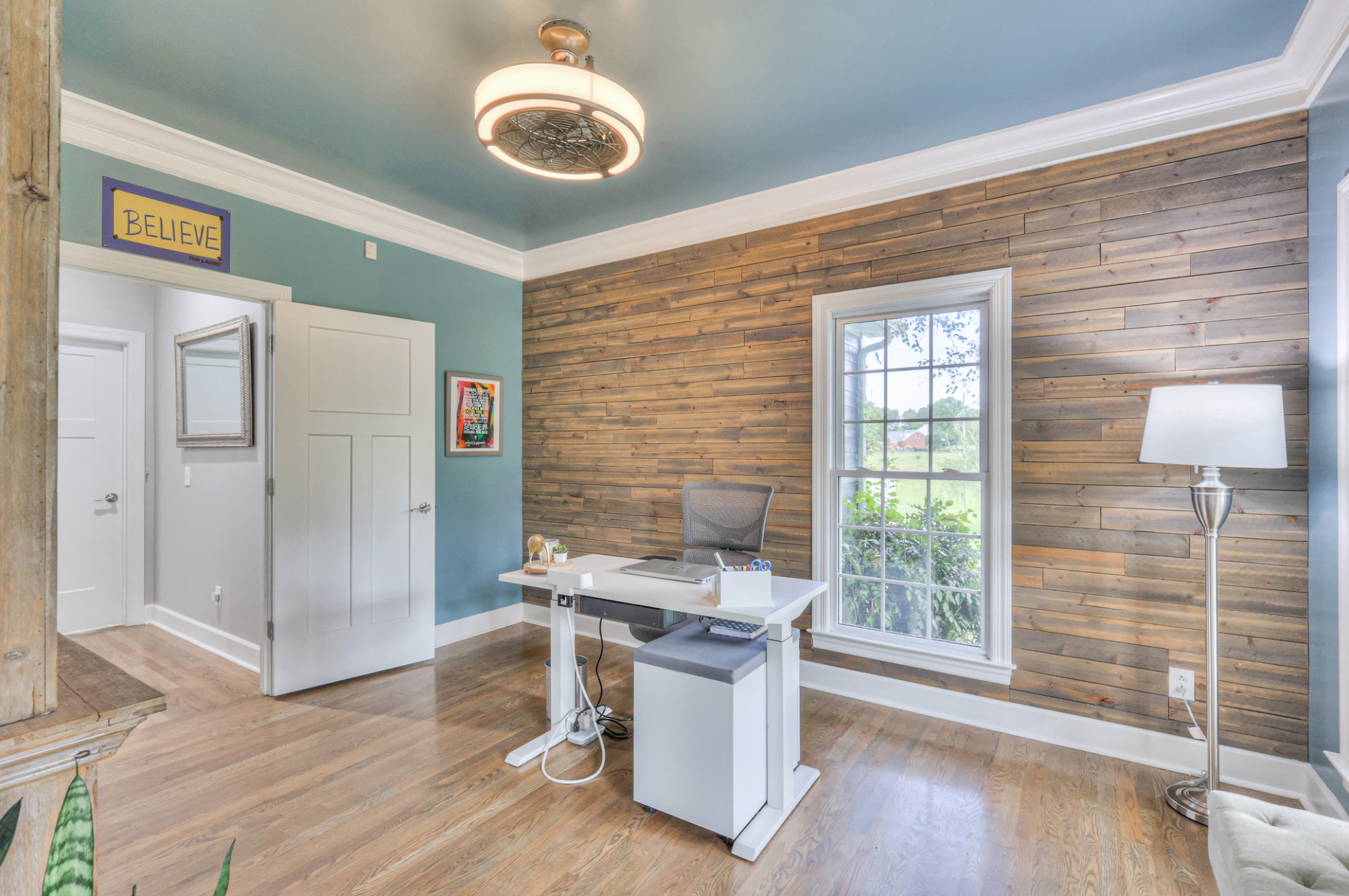 Office with plenty of natural light right off the main entrance. Door on the left leads directly to master bedroom