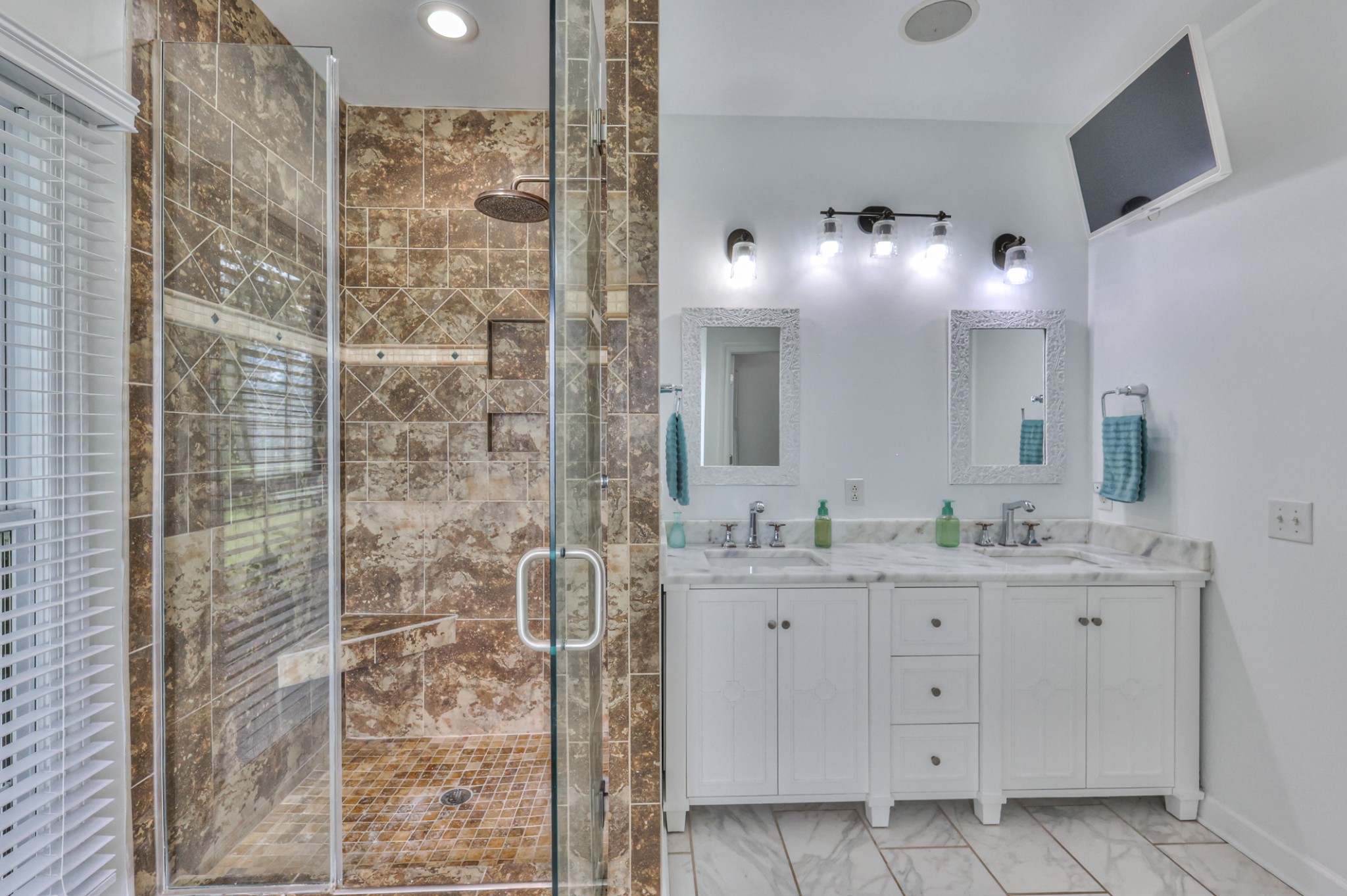 Tile shower. You can watch TV from the tub