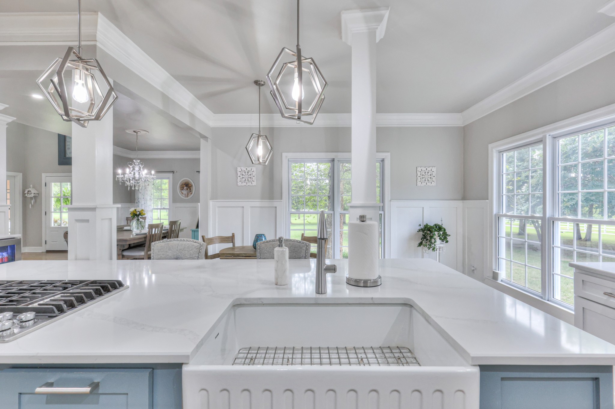 Touch kitchen faucet. One tap on the side for cold. Two taps on the side for warm. Three taps for hot water from your tankless hot water heater.