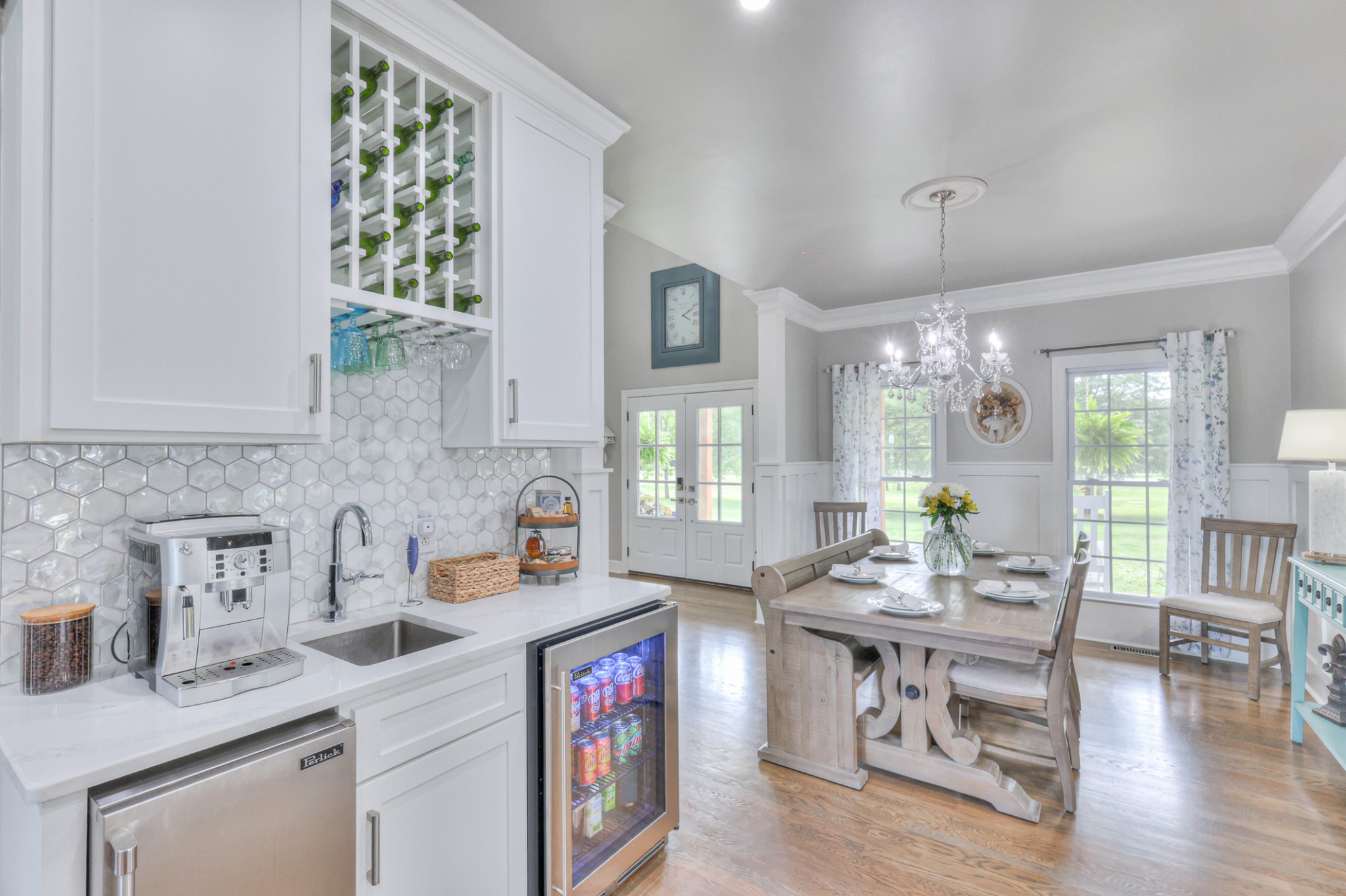 Coffee/wet bar centrally located. Check out the backsplash