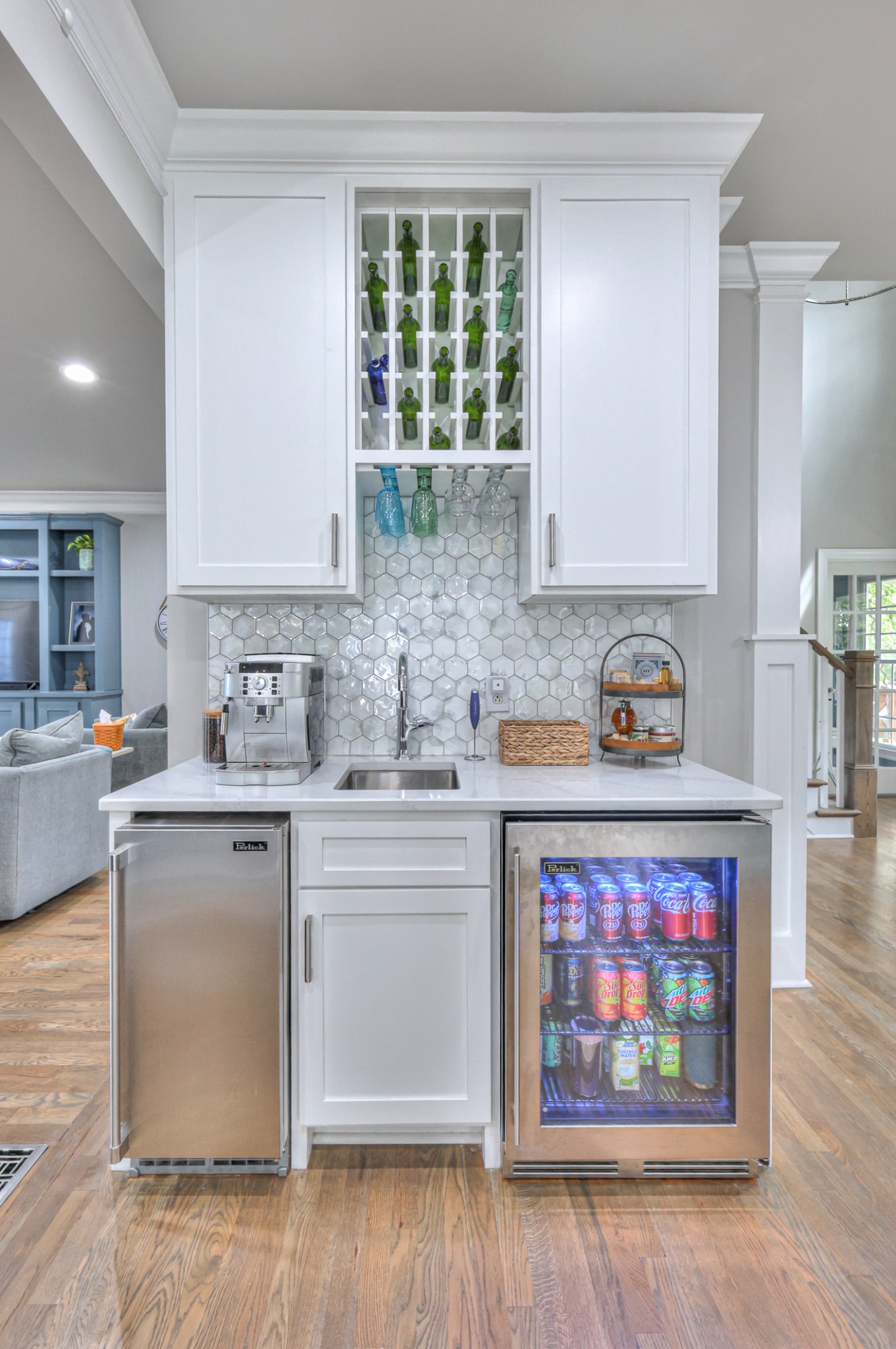 Coffee/wet bar with ice maker, sink, wine rack and cooler