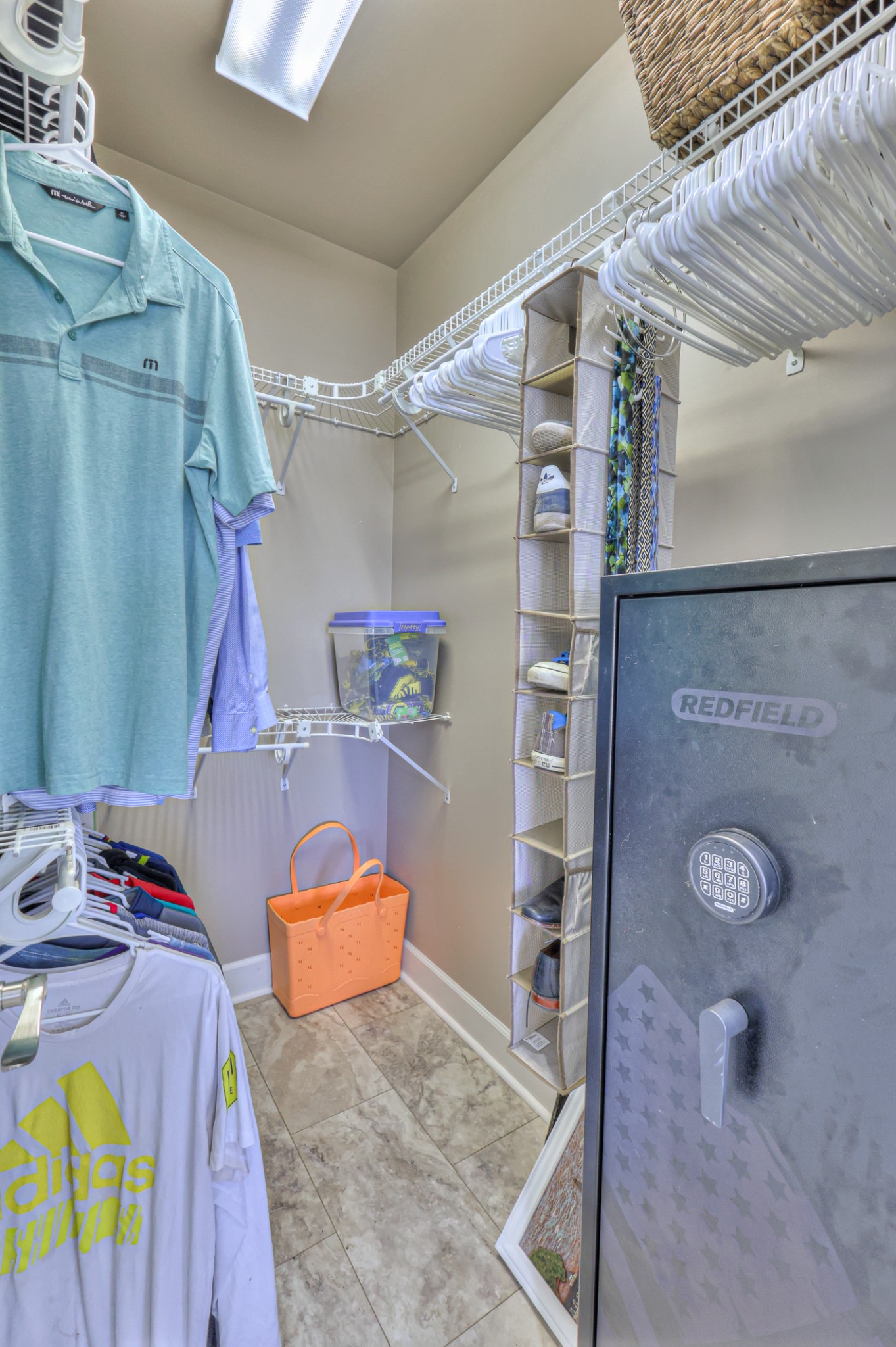 "His" walk in closet with plenty of room