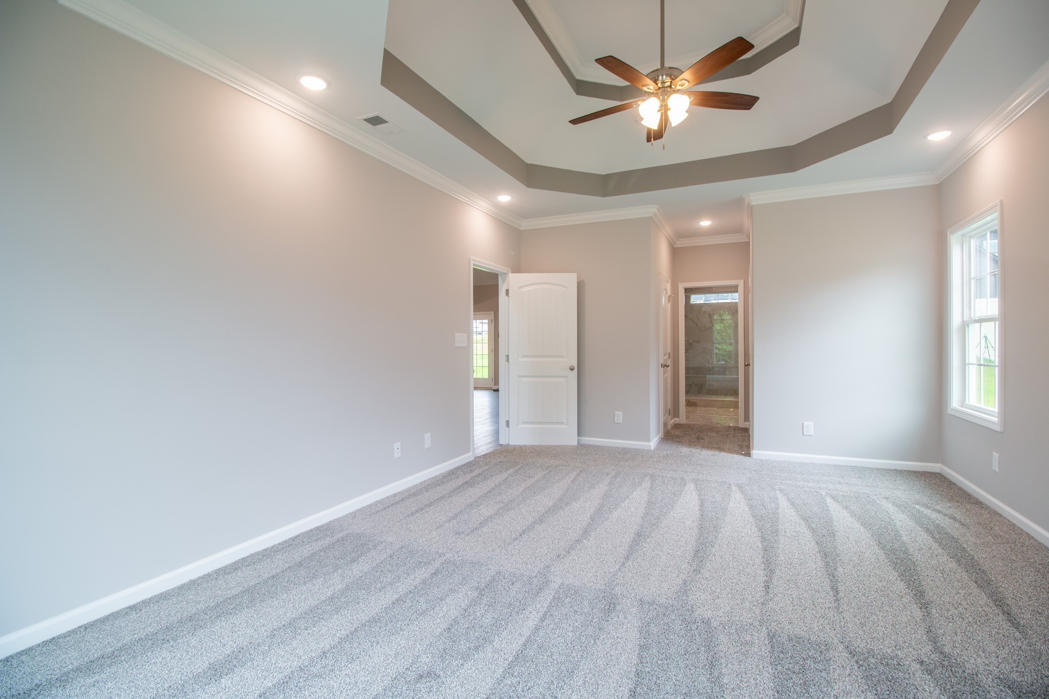 Another View of the Primary Bedroom with 2 Walk-in Closets!