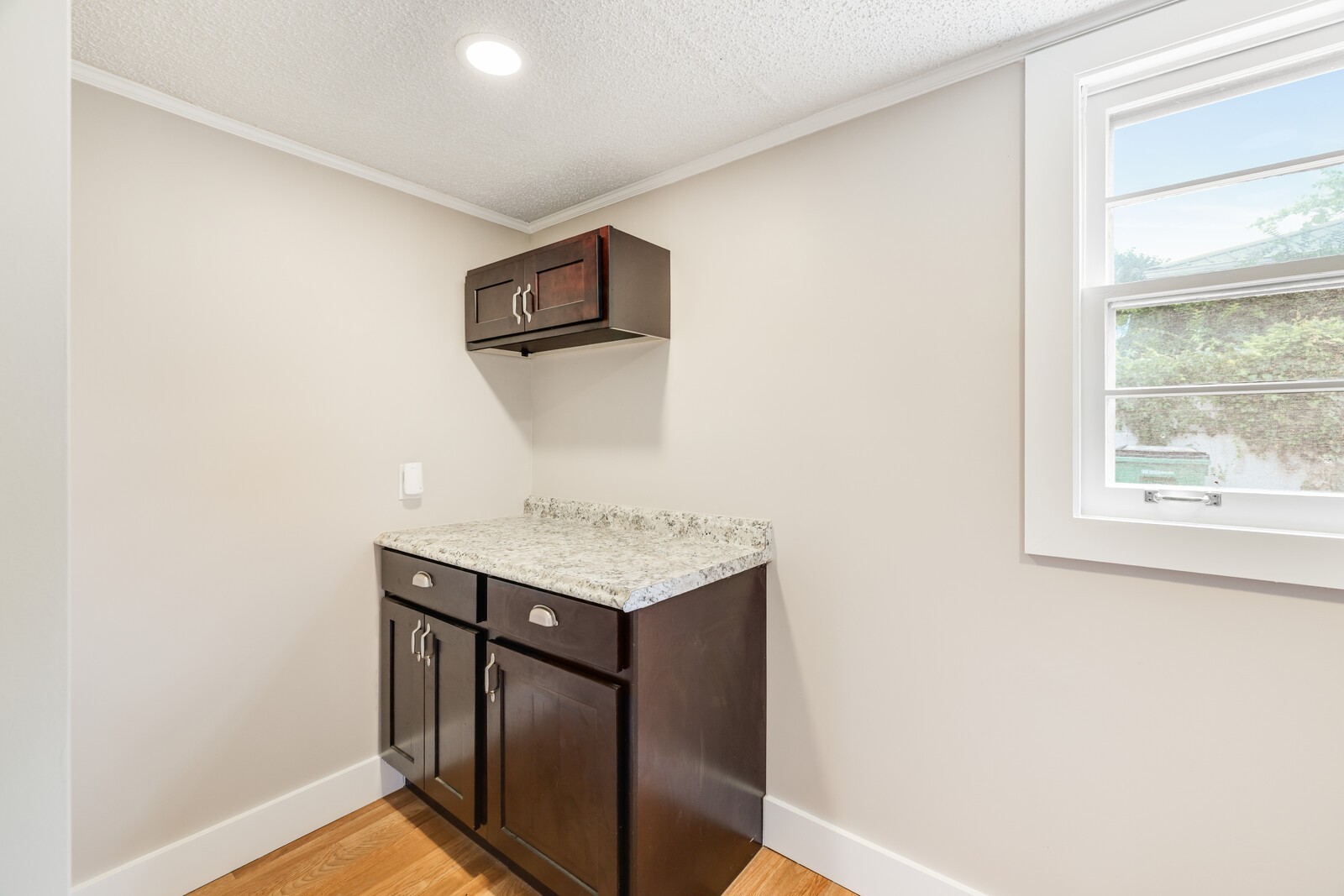 Nice storage and folding area in the laundry room
