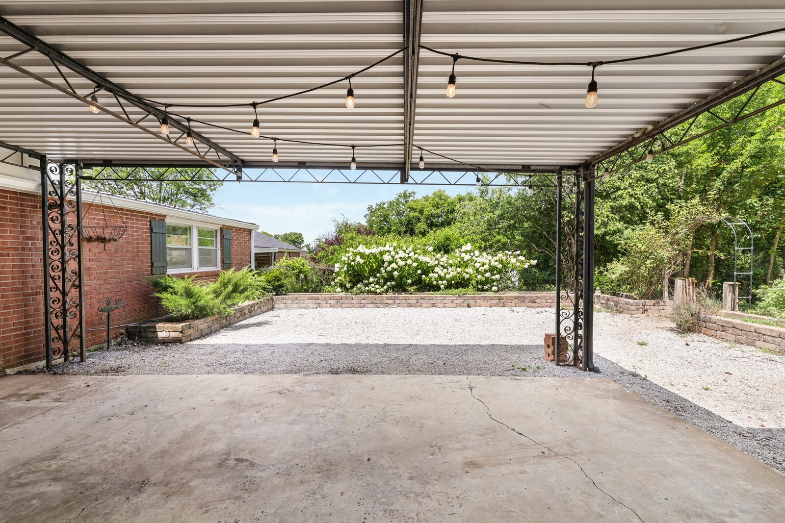 Carport with side area for chairs, grills, entertaining
