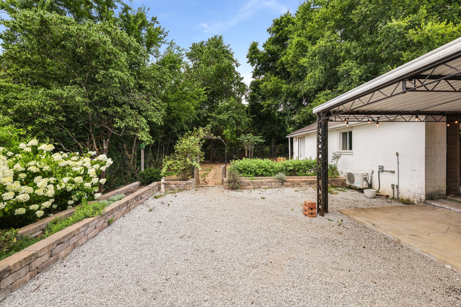 Enter the backyard via a lovely trellis