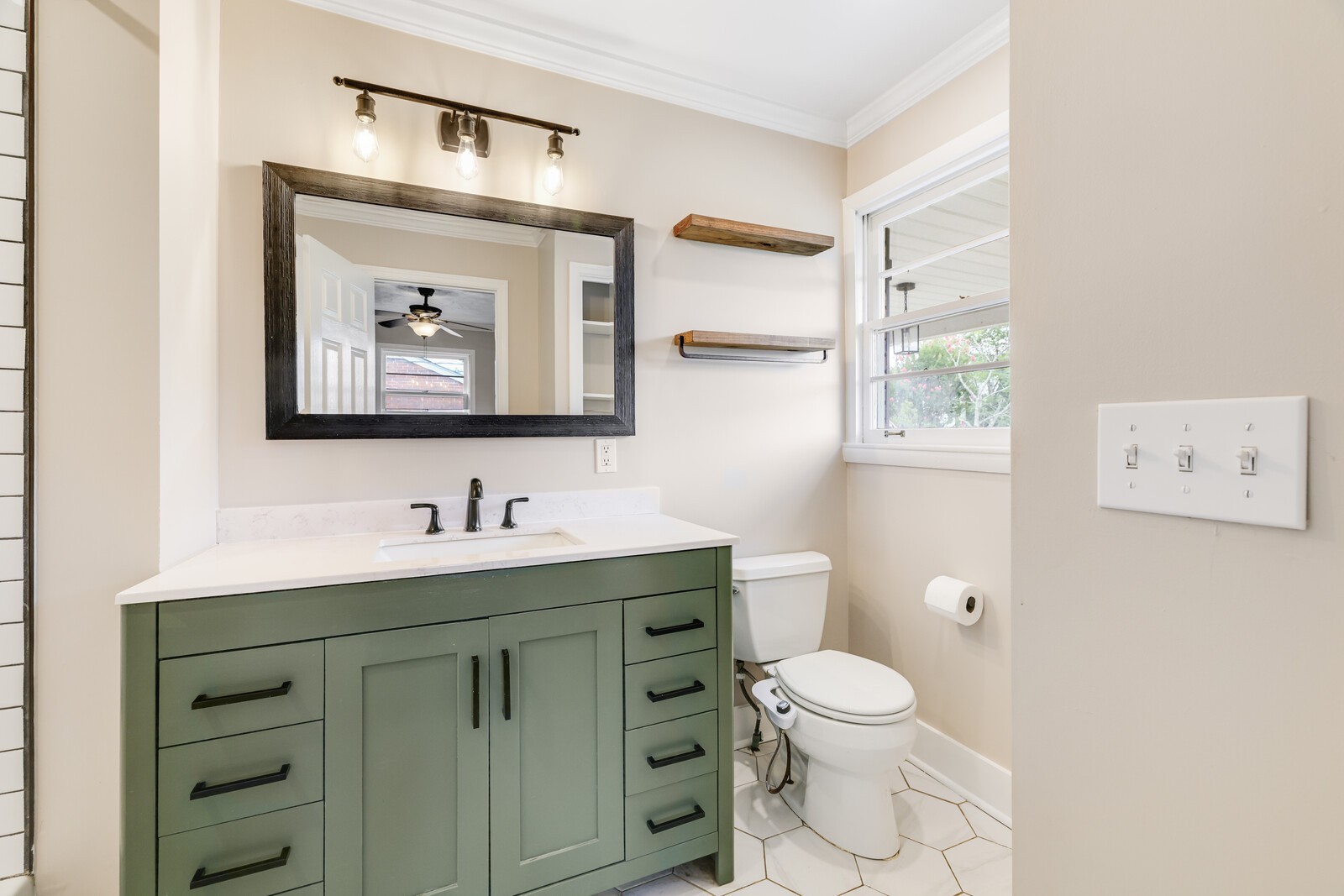 The primary bathroom has been beautifully updated