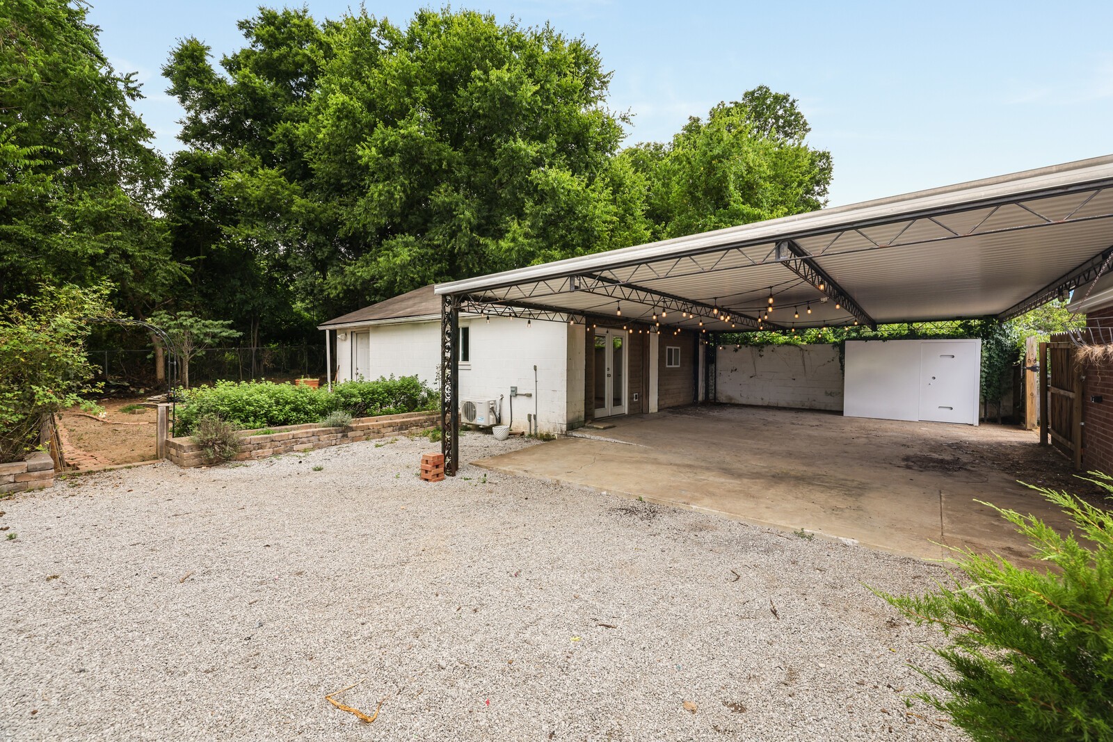 The backyard has endless options/areas for entertaining or play