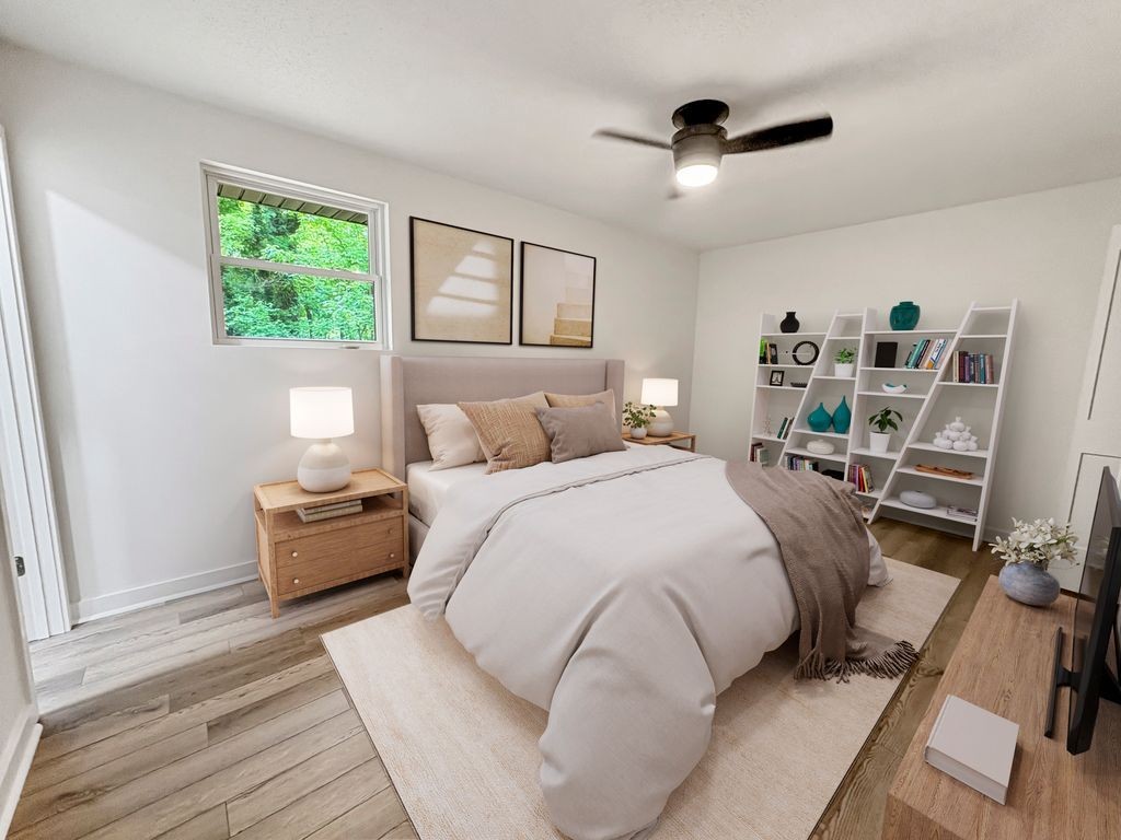 Primary Bedroom - This photo is virtually staged.