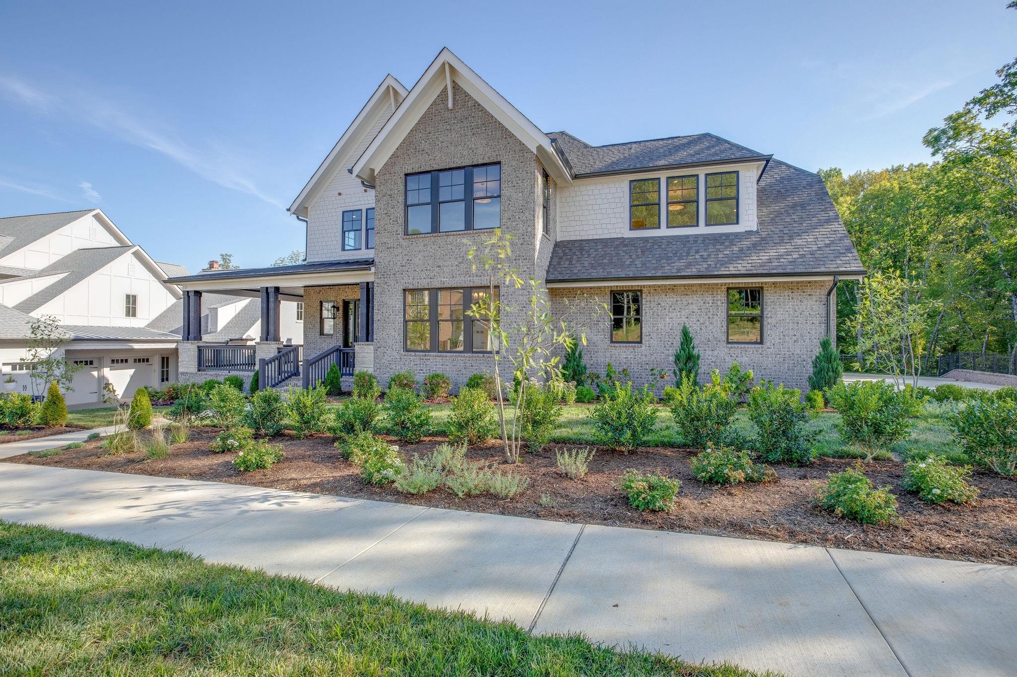 8637 Belladonna Dr (Lot 7033) College Grove, Tennessee This home makes a great first impression with a large, welcoming front porch and two-story foyer. Master suite with enormous walk-in closet will surely accommodate two wardrobes. Impressive walk-out basement features kitchenette and fireplace. Elevator serves all 3 floors! The Grove offers resort-style amenities such as championship golf course, multiple dining options, full-service spa, fitness center, two pools, world-class equestrian facility and children's programs.