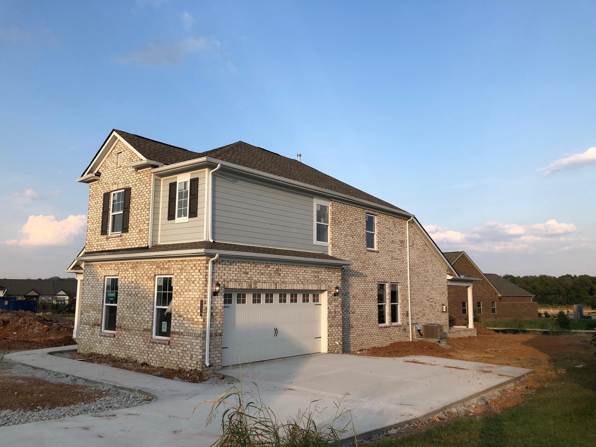 3220 Rift Lane LOT 13 Murfreesboro, Tennessee MOVE IN READY! Take advantage of this pricing! Fully loaded smart home powered by Amazon! Natural gas with pool & walking trails going in. HUGE COVERED PATIO. Blinds and all stainless steel kitchen appliances included. Encourage you to drive through community, very charming.
