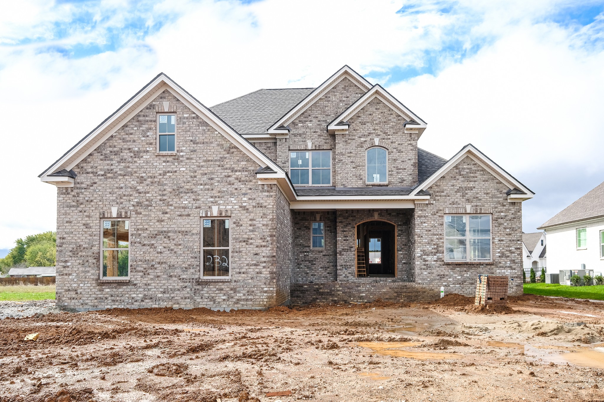 2045 Autumn Ridge Way (Lot 232) Spring Hill, Tennessee Adorable home by Landmark Building Corporation. Open concept. Master and office down. Vaulted great room with gas fireplace. Bright,eat-in kitchen with ample cabinets, stainless appliances, nice pantry and entertainment bar. Jack/Jill between 2 beds up with private vanity for each room. 3rd bedroom up has ensuite bath. 3/4" sanded/finished hardwoods...even in master. Master bath has double vanity, shower, stand-alone tub and opens to huge master closet. BEAUTIFUL COMMUNITY-WONDERFUL AMENITIES!