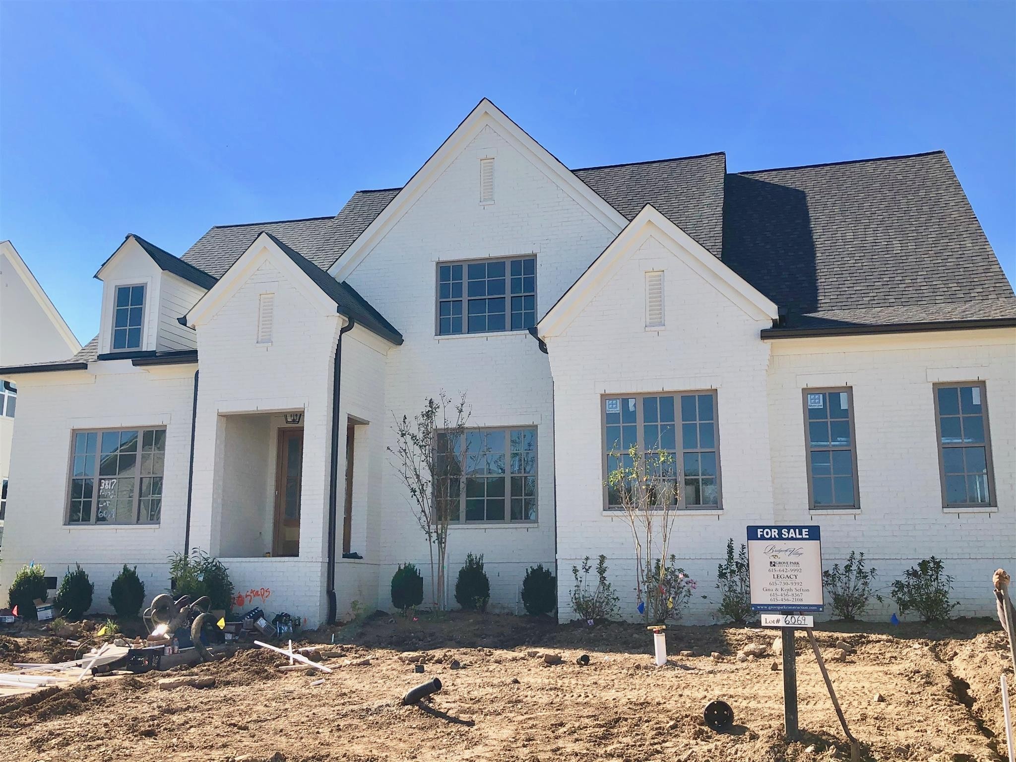 3817 PULPMILL DRIVE LOT 6069 6069 Thompsons Station, Tennessee HOME FOR THE HOLIDAYS! NEW GROVE PARK CONSTRUCTION, Backing to Acres of Open Space! LOADED w/Designer Finishes*Hrdwd t/o ENTIRE MAIN Lev*Fully Sodded/Irrigated Yard*Covered Porch w/ Wood Burning Fireplace*Open Kit/Casual Dining & Family Rm*Butler Pantry*DIning*Proper Study!! Move In Before Christmas!