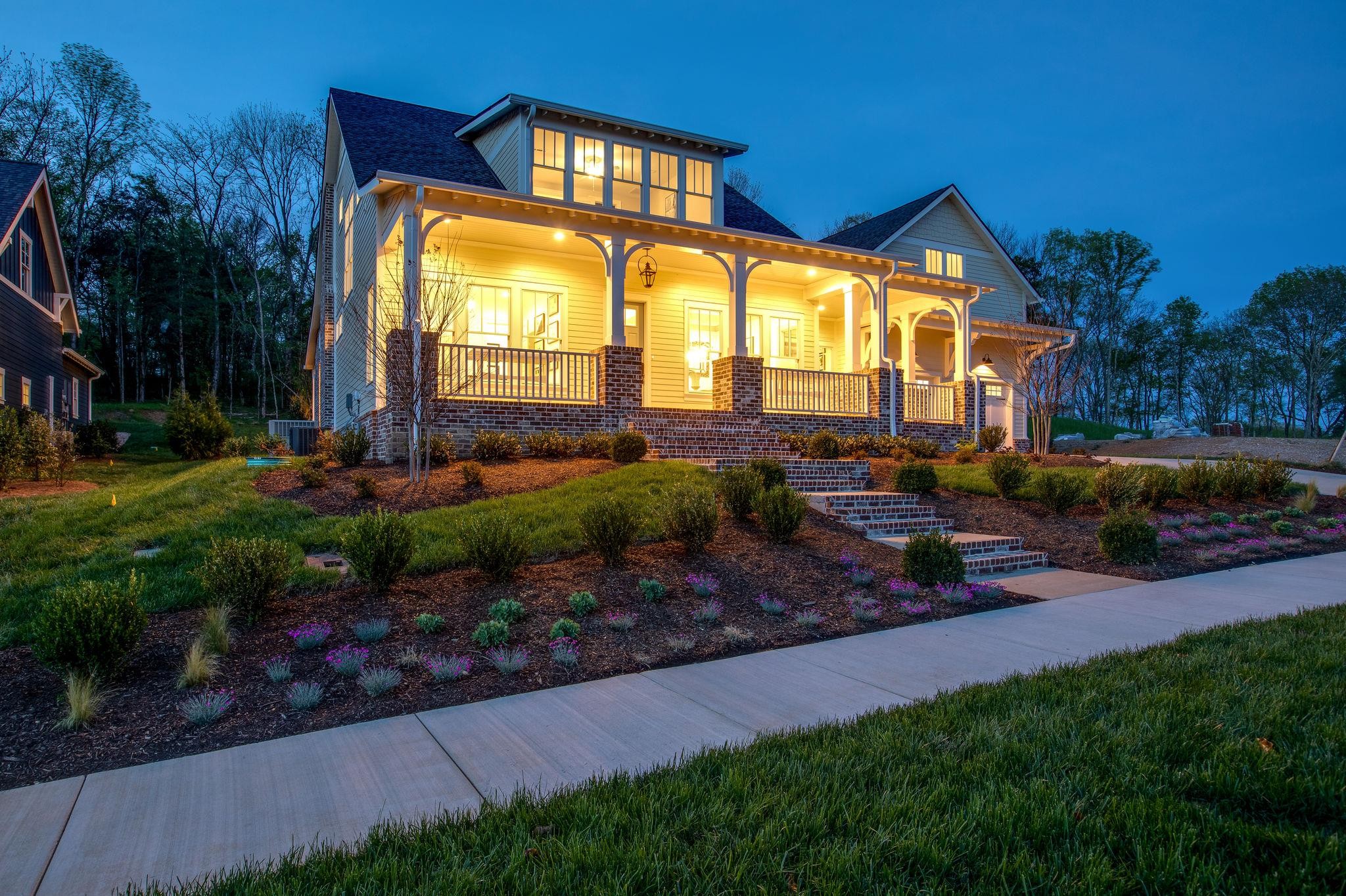 8664 Belladonna Dr (9002) College Grove, Tennessee The Summertime floorplan, designed by the highly acclaimed Alyson Sailer, offers open spaces and large porches allowing for a seamless flow between indoor and outdoor living creating a truly functional plan. The quaint roofline, dormers and brackets bring in the character of a 1920s Craftsman bungalow and no southern home would be complete without a large front porch.
