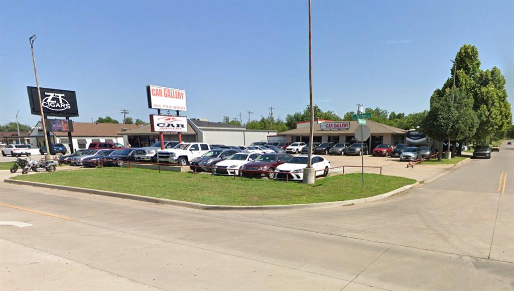 Property is commercially zoned along with a special use permit for use as a car dealership. It consists of a 4,288 SF main building consisting of 2,200 SF for Office and Showroom and 2,068 SF shop. There is also a 300 SF enclosed parts area. The second structure is a 4,100 SF steel carport enclosed on two sides perfect for additional car storage/display or mechanical/detailing services. The property is 21,600 SF overall (90' frontage and 240' depth) and is in great condition with many of the upgrades in 2020. The owner reported that at full capacity it can hold between 85 and 90 vehicles.