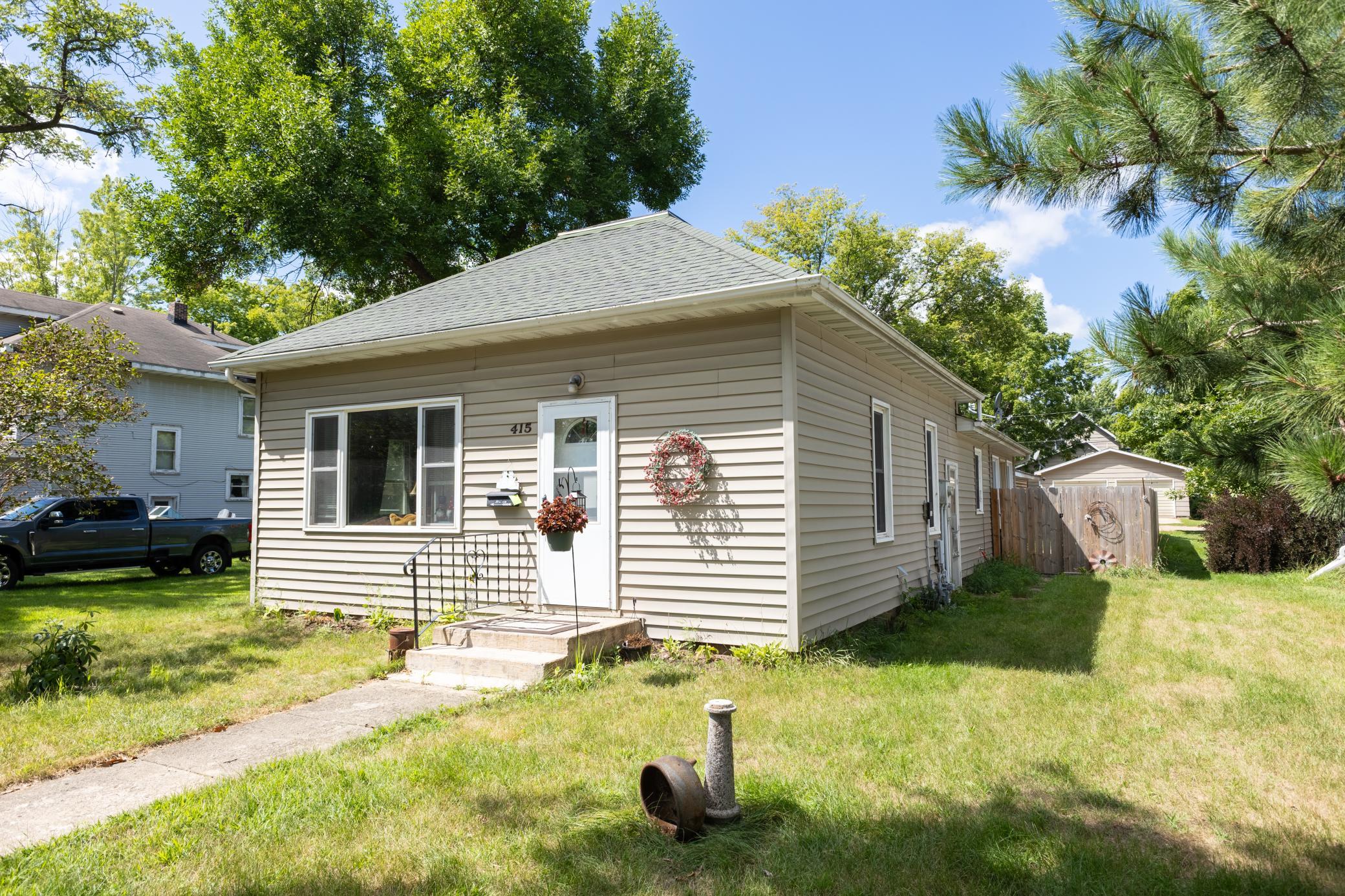 Charming Wadena city home is approximately 1400 sq feet and comes with 3 bedrooms, 1 full bath, a large eat-in kitchen, and a cozy 3 season porch. This home also has a fenced in yard, detached 2 stall garage and an extra finished space on the lower level for a home office or den. It's heated with natural gas and cooled with central air conditioning. There is natural woodwork adorning the home plus tile flooring and carpet. This beautiful home is also conveniently located to downtown amenities in Wadena. (Sale excludes chandelier in sunroom. Seller will replace fixture.)