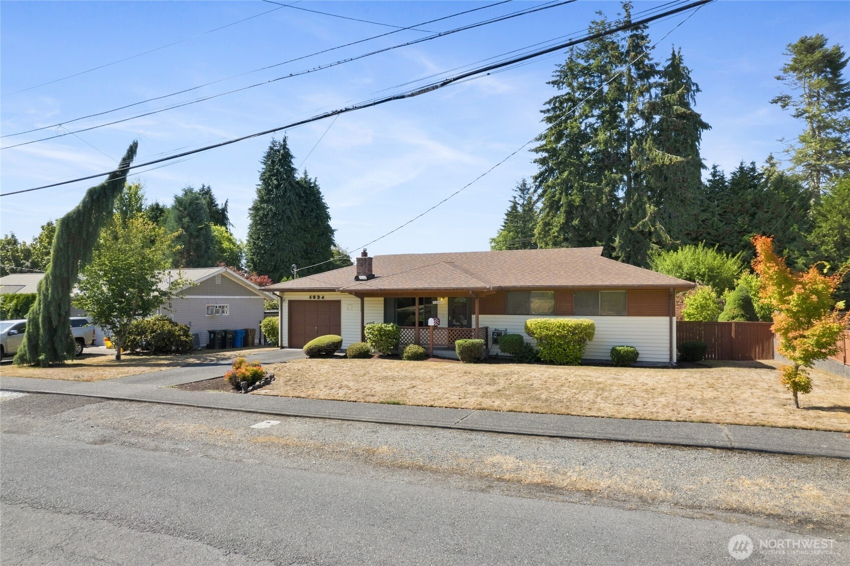 If you are looking for 1 level living and a big shop for toys or tinkering? Look no further than this well maintained home with newer roof, HVAC and H2O heater. Featuring 4 bedrooms, 2 baths, an awesome recreation room downstairs, attached garage, attached carport area and a large, detached shop and RV port off the alley. With tons of storage, close to amenities, a city park 1 block away and 1 minute to hwy 16.
