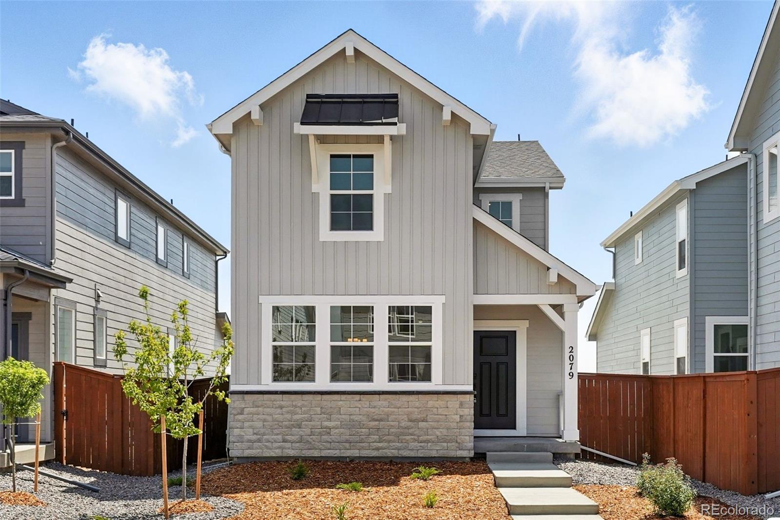 MLS#2935312 New Construction - Ready Now! Welcome to the Celeste at Farmlore—a smartly designed home with comfort and connection in mind. The main floor opens into a light-filled gathering room that flows easily into the dining area and kitchen. Step outside to the patio and enjoy even more room to relax or entertain. Upstairs, the spacious primary suite features a large walk-in closet and a 4-piece bath. You’ll also find two additional bedrooms—each with its own walk-in closet—a convenient laundry area, and plenty of space to make your own. Structural options added include: built in appliances, patio, and additional sink at upstairs bath.