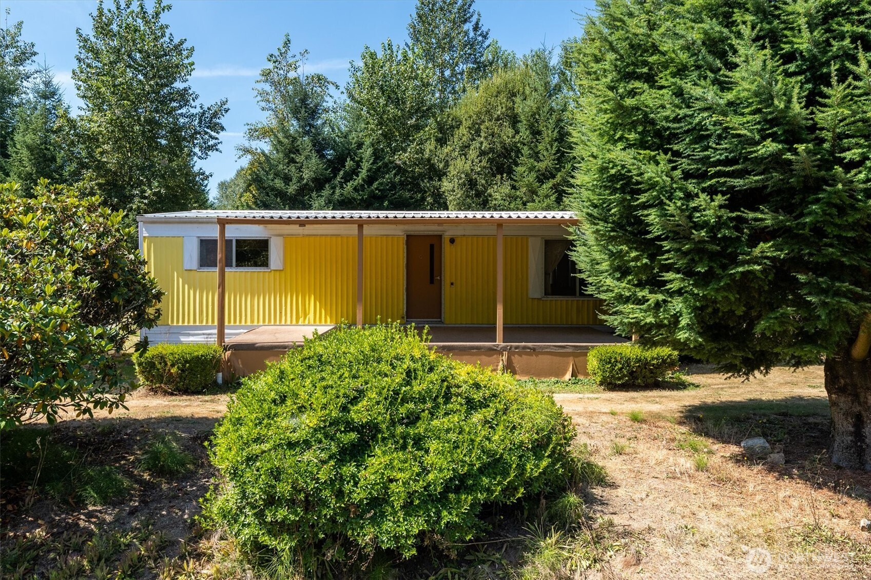 This 1974 double-wide offers a rare combination: real ownership (land included, not leased!) and an unbeatable price point. Inside, you'll find  a large 2 bed/1 bath home with an open, flexible layout ready for your personal touch. Outside, enjoy a spacious 19x16 carport for covered parking or storage, plus a generous .28-acre lot with room to garden, park an RV, or simply spread out. This  home needs some tlc but is currently livable and has tons of potential - bring your vision and make it your own. Priced to move, this won't last. Sale is as-is, cash only. Schedule your showing today! Seller is open to a package deal with this and the adjacent 1.45 acre lot (parcel 030502017000).