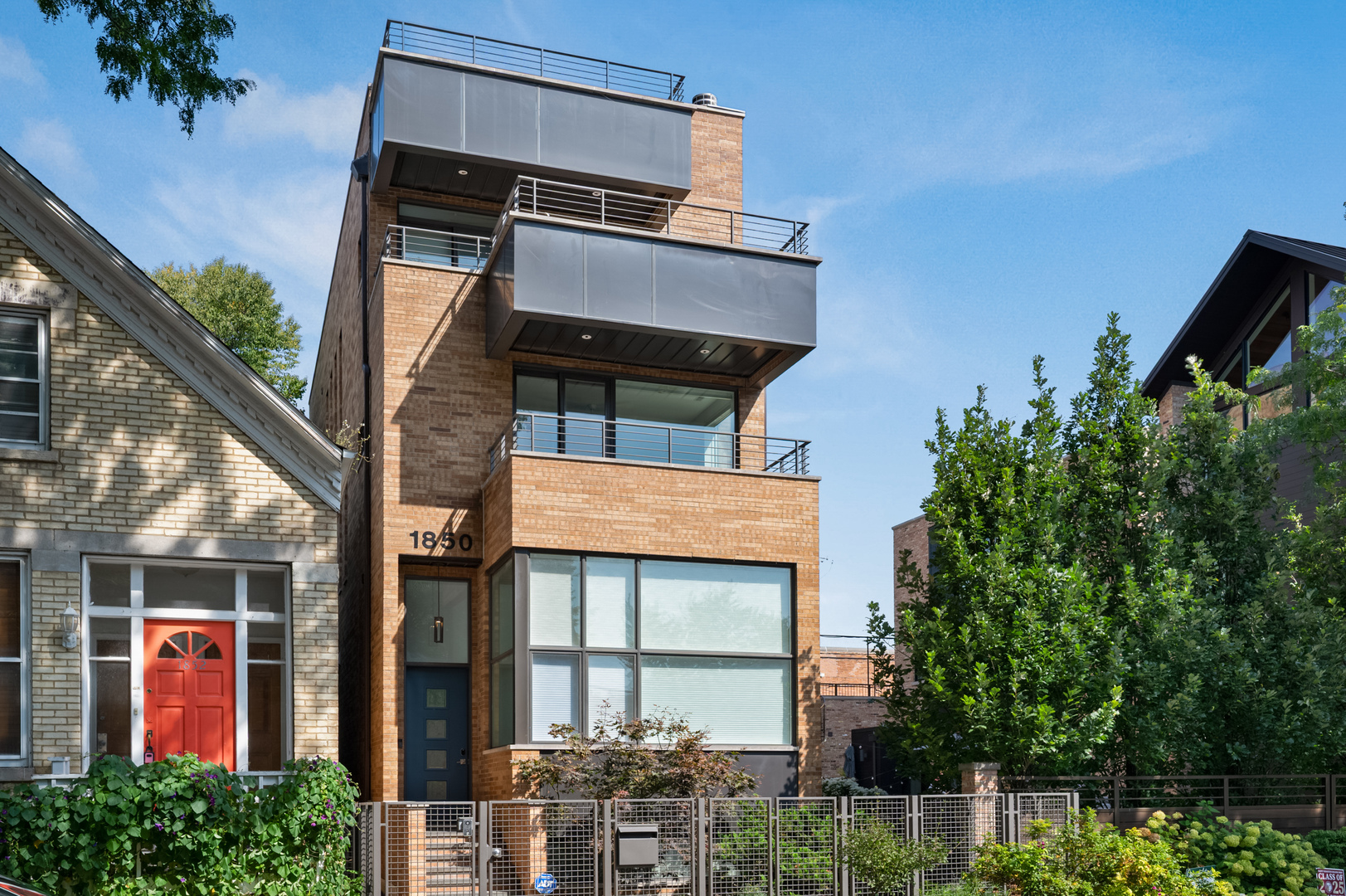 Welcome home to this sprawling modern oasis with five bedrooms, 3.5 bathrooms, a family room, dedicated office, wine cellar, and sauna. Located in the sought-after Pritzker School District, this over 5,000 sq ft modern masterpiece is just steps from Division Street and all the best that Bucktown and Wicker Park have to offer. Soaring ceilings throughout (10-12 feet) create an airy, dramatic feel. The ideal layout includes 4 bedrooms and a full laundry room on the upper level, along with multiple outdoor spaces-deck over the garage and a rooftop with unobstructed panoramic city views all year round. Light floods the home from every direction, thanks to a rare rear exposure and neighboring side yard. The chef's kitchen features professional-grade granite countertops, Arclinea cabinetry, Miele and Sub-Zero appliances, and opens to both the living room with fireplace and a stunning family room with separate dining area. This large and perfectly appointed kitchen makes cooking and entertaining a true experience. The primary bedroom provides you with serene privacy and the ultimate place for relaxation. Your en suite primary bath is truly spa-like, with a separate soaking tub, steam/shower system, and radiant heated floors. The incredible lower level includes a guest suite, a nearly 400-bottle brick wine cellar, second laundry center, and sauna. Zoned HVAC and a 2-car garage complete this exceptional home. No detail soared with recent updates to include new water heater, snow melt on stairs and walkway to house, newly installed decking on rooftop and additional decking and netting installed on garage roof. Ideally located between the intersection of Milwaukee Avenue/Damen Avenue and Western Avenue, near the North Branch of the Chicago River and the 606 Trail, enjoy walking to top rated restaurants, shopping, easy access to parks, public transportation and an abundance of activities.