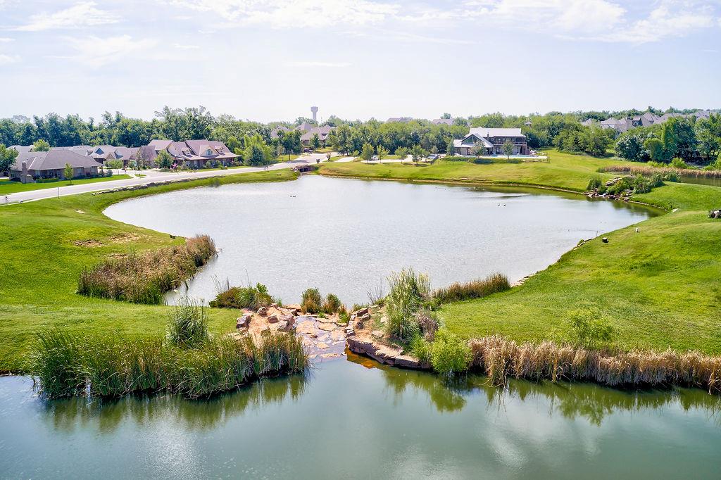 This is just one of several different types of lots ranging from $60,000 to $125,000. This particular lot is a really good size and in a cul-de-sac. The neighborhood offers a variety of different lot sizes, prices, and desirable views. All homeowners will benefit from the abundance of amenities this well thought out subdivision has to offer. The clubhouse is simply spectacular with none other like it in Norman. This clubhouse is available to residents for private parties as well as daily use when not reserved. The pool is an official lap size pool which allows plenty of space for all. Enjoy fishing in the private lake, walking trails, and expansive greenbelts. Hallbrooke offers several outstanding builders to choose from. Imagine coming home to Hallbrooke. Welcome Home!