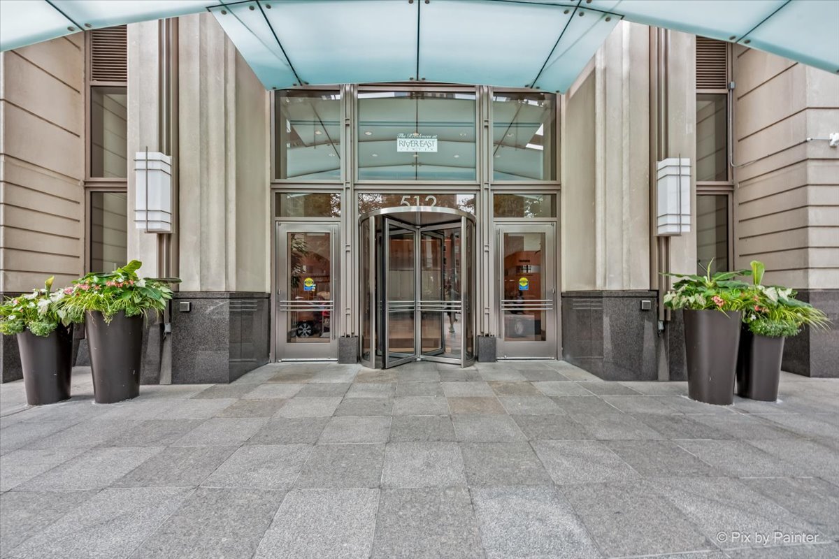 Discover the best of city living in this immaculate 2-bedroom, 2-bath corner condo in the heart of vibrant Streeterville. SOLD FULLY FURNISHED with TVs, this 1,445 sq. ft. residence showcases stunning city and lake views.***    The sun-filled living room features expansive windows with elegant stone ledges, seamlessly flowing into the open-concept kitchen-ideal for entertaining. Enjoy abundant cabinetry, a stylish tiled backsplash, island seating, and a complete set of stainless-steel appliances. Gleaming hardwood floors extend throughout the main living areas, bedrooms, and hallway, creating a warm, cohesive feel.***    The private primary suite offers ample space for a full furniture set and includes soffit and track lighting, a custom-organized closet, and a serene ensuite with a soaking tub and wide vanity with generous storage. The second bedroom, with its full wall of windows, is perfect for guests, a home office, or both. A second full bath is conveniently located near the brand-new, full-size front-loading washer and dryer.***    This well-managed, full-amenity building offers some of the lowest HOA fees in the city for its size, along with 24-hour door staff, onsite management and maintenance, a fitness center, renovated entertainment suite, conference room, storage locker, bike room, and a beautifully landscaped sundeck with grilling stations.***    Unmatched location-steps from Northwestern University and Medical Campus, Target, Whole Foods, Walgreens, AMC theater, public transit, and countless dining options. Don't miss the opportunity to make this exceptional Streeterville condo your next home!**  ***SOLD AS-IS***