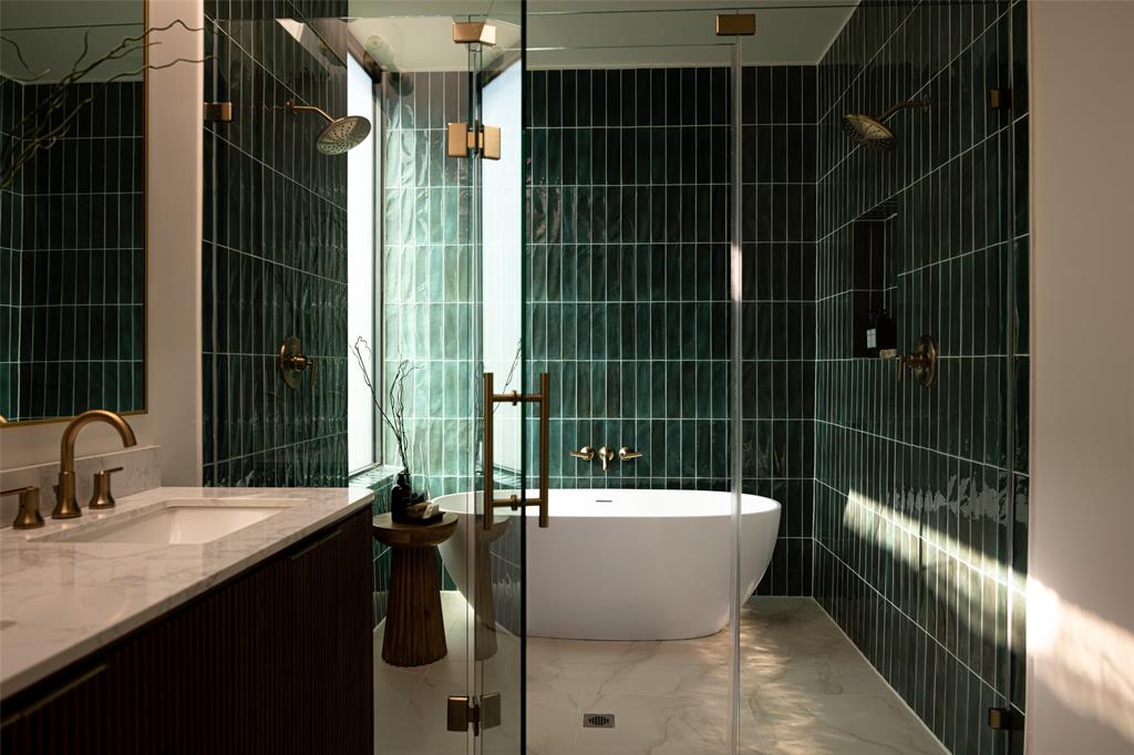 Exceptional new construction designed by award-winning Far + Dang, pairing striking modern architecture with elevated interiors and remarkable construction quality. Wide-plank wood flooring and Level 4 wall finishes create a refined backdrop throughout, while the custom European-style kitchen features quartz countertops and high-end Italian Bertazzoni appliances, including a 36-inch range. Furniture-grade bathroom vanities, generous soaking tubs, finished under-stair storage, and a thoughtfully designed laundry area reflect the attention to detail throughout.Beyond the finishes, this home was built to an exceptional standard. The entire development is supported by 82 foundation piers extending 20 feet deep and features substantial exterior framing, structural steel reinforcement, full-cavity foam insulation, a Class 4 hail-resistant roof, maintenance-free Kynar-coated steel exterior with a 40-year warranty, and high-efficiency imported European windows.High-efficiency Carrier HVAC with individual controls on each level and a looped tankless hot-water system provide added comfort and efficiency. The insulated double-steel garage doors include battery backup, and the garage is pre-wired for two electric vehicles.Low-water landscaping and HOA-maintained exteriors complete the lock-and-leave lifestyle. Thoughtfully designed, beautifully finished, and exceptionally well built, this is modern new construction where the quality extends far beyond what you can see. (New address is 4310 Liscannor Drive - 1918 N Peak was the address prior to construction but it is how you can find the property on your map) - Qualifies for FHA and VA Loans because this is a fee simple townhome