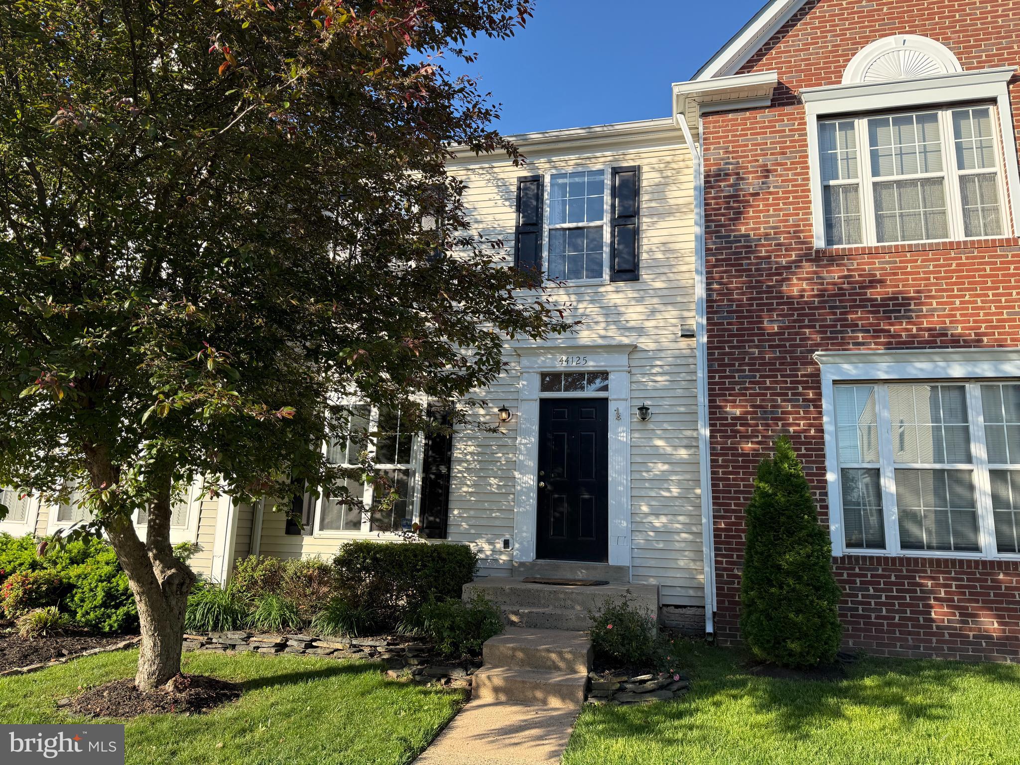 Welcome to this beautifully refreshed townhome nestled in the sought-after Ashburn Village community, where resort-style amenities, scenic trails, and everyday conveniences come together seamlessly. Backing to serene water views, this home offers a tranquil backdrop that makes every day feel like a retreat. Step inside and feel the difference of thoughtful updates throughout. Fresh paint and plush new carpet create a bright, move-in-ready feel, while refinished hardwood floors add warmth and character. The kitchen shines with sleek quartz countertops and stainless steel appliances — a space that blends style with function. Three fully finished levels provide room for everyone. The walk-out basement expands your living options — ideal for a rec room, home office, or guest suite — with direct access to the fully fenced backyard, perfect for entertaining, gardening, or simply enjoying those peaceful water views in privacy. Location checks every box: stroll to the beloved W&OD Trail for biking and walking, enjoy the ease of a neighborhood elementary school just around the corner, and take full advantage of everything Ashburn Village has to offer — pools, sports courts, trails, and more.