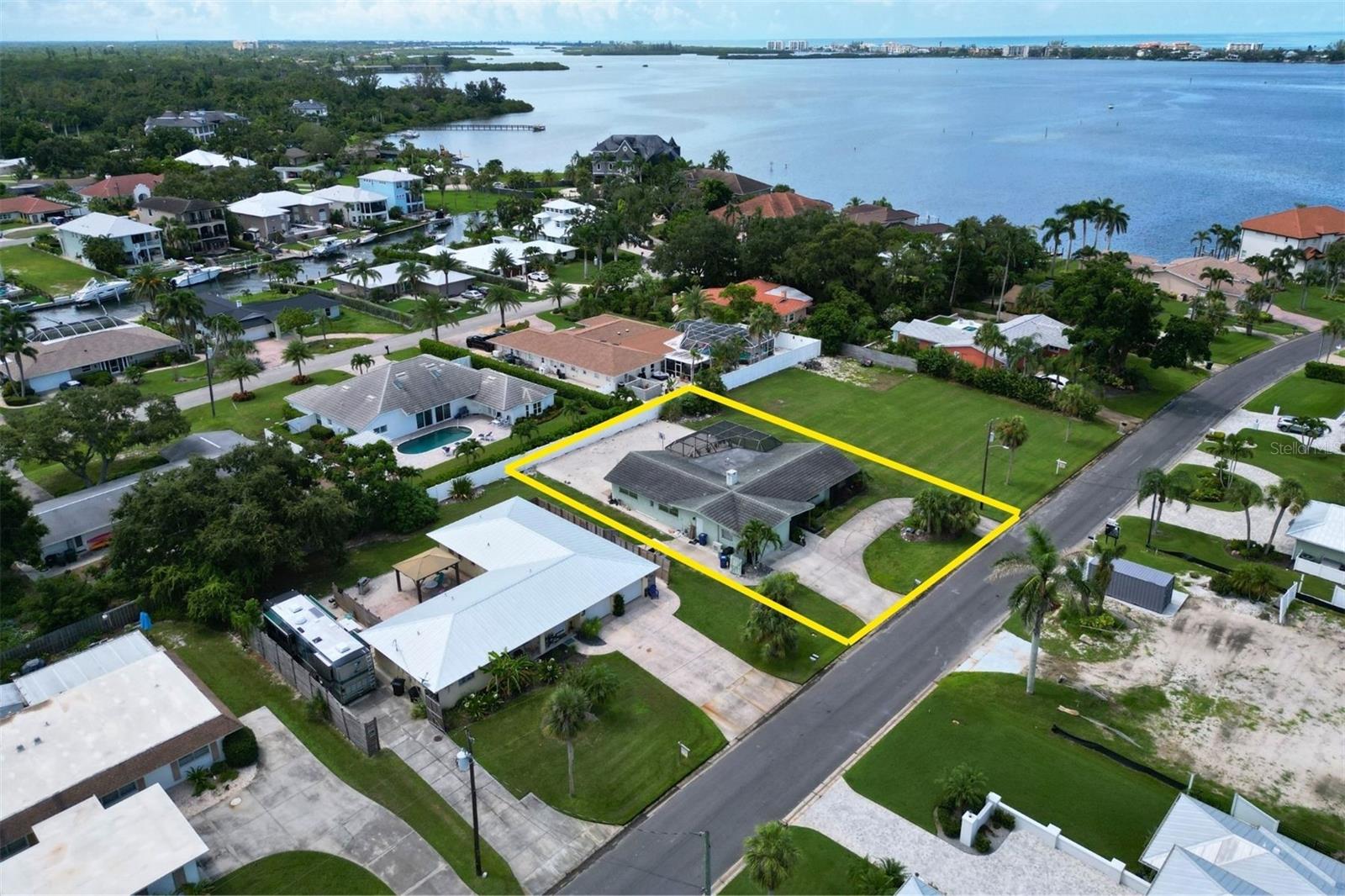 This charming and versatile 4-bedroom, 3-bathroom home offers a spacious layout and unique potential for customization or expansion. The interior flows seamlessly to a private screened-in in-ground pool—ideal for entertaining or relaxing under the Florida sun. With access to a shared community boat dock, this property is perfect as a primary residence, seasonal getaway, or income-producing rental.

1848 Southpointe Dr may be purchased individually or as part of a rare assemblage opportunity totaling 38,301 SF across three parcels. In addition to this single-family home, the assemblage includes a 1,933 SF duplex and an adjacent vacant lot—providing unmatched flexibility for redevelopment, investment, or multi-generational living.