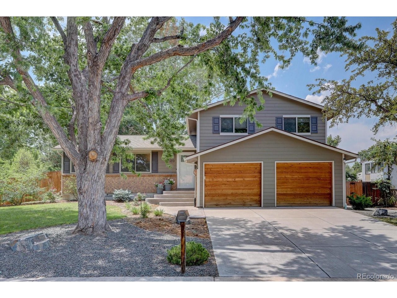 Beautifully updated tri-level home ready for immediate occupancy. Fresh paint throughout provides a clean, move-in-ready environment. The standout feature is the recently renovated bathrooms with quality fixtures and finishes that reflect attention to detail throughout the property.Open-concept living areas with large windows flood the home with natural light and frame views of the professionally landscaped backyard. This outdoor space is a true highlight featuring mature trees, garden beds, and thoughtful hardscaping that create a private oasis perfect for entertaining or relaxation.The kitchen features a layout ideal for both cooking and casual gathering. Multiple bedrooms and bathrooms provide comfortable accommodations for the whole family. All major systems have been updated, including electrical, and plumbing giving buyers peace of mind with reliable infrastructure. The basement features a gas fireplace for cozy nights in.The oversized two-car attached garage provides ample storage and vehicle protection. Located in an established neighborhoodknow for well-maintained homes and strong community pride of ownership, this property sits among neighbors who care about     their properties.This is a well-cared-for home with quality updates in the right places. Perfect for buyers seeking a move-in-ready property in a  stable, attractive neighborhood.