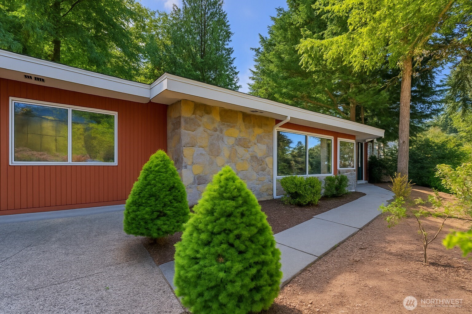 Location, location, location! This beautifully updated 4-bedroom, 1.75-bath rambler sits in the desirable North End of Mercer Island, just steps from downtown with easy access to highways and top-rated schools. Renovated in 2021, it features a modern kitchen, updated bathrooms, new LVP flooring, upgraded electrical and plumbing, newer interior and exterior paint. Set on a spacious 13,000+ sq ft lot, the home offers lush greenery, excellent privacy, and a peaceful setting. There's also potential to add a second story and capture stunning lake views—an incredible opportunity in a prime location.