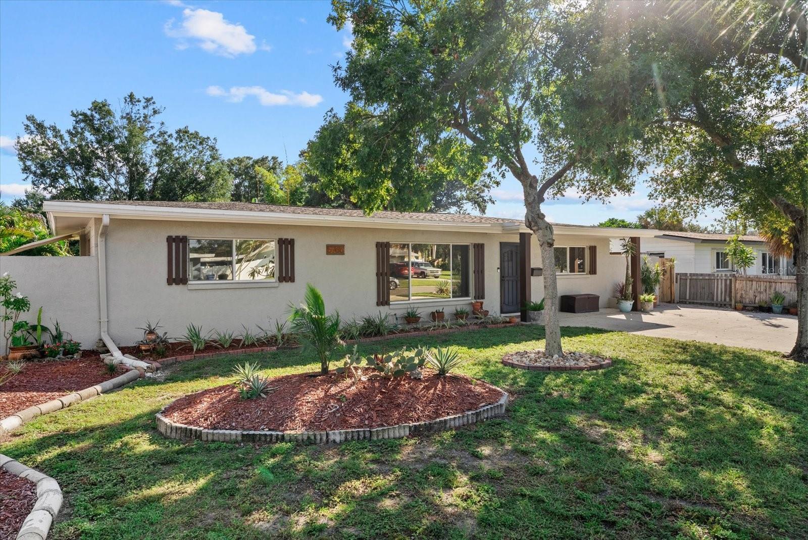 Welcome to this beautiful 3-bedroom home featuring an inviting open floor plan, a large swimming pool, and a spacious fenced backyard! The welcoming living area flows seamlessly into the kitchen, making it ideal for everyday living and entertaining. The kitchen features a center island, granite countertops, subway tile backsplash, and stainless steel appliances. French doors lead to the large screened lanai, offering the perfect space for relaxing, outdoor dining, or entertaining family and friends. Step outside and enjoy the sparkling swimming pool and spacious fenced backyard, providing plenty of room for outdoor activities, pets, and gatherings. Conveniently located near shopping, restaurants, and everyday amenities, with beautiful beaches just a short drive away. Whether you're relaxing poolside or enjoying time with family and friends, this home offers the perfect blend of comfort, convenience, and Florida living. Don't miss this wonderful opportunity!