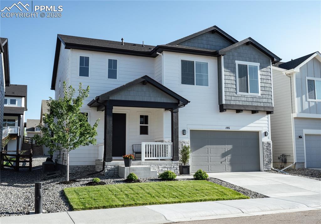 Exquisitely designed and upgraded new home in the prestigious Montaine community which hosts native elk that roam the open space, miles of walking trails with mountain views, and an extravagant community center with gym and pool. This brand new home built by Toll Brothers has been thoughtfully upgraded by the owners with timeless design aesthetic. Designer Hinkley light fixtures and chandeliers throughout the home, Graber blinds, professional epoxy garage floor coating, brand new extended concrete patio, matching stone work across the front porch, and three additional American Sentry Linden trees for fall colors. Walk in and experience the natural light pouring into this two-story great room. Your entire main floor is an entertainers dream with an upgraded kitchen island, striking two story tiled fireplace, leathered black pearl granite counters, and textured porcelain tile backsplash. The main floor also boasts a private office and walk-in pantry. The modern handrail brings you upstairs where you'll find the generously sized primary suite, laundry, two other bedrooms, and another upgraded full bathroom with floor to ceiling tile. The large primary bath hosts split vanities, Hinkley lighting, large shower with floor to ceiling tile and a walk-in closet. The garage is three car tandem and extra deep. The main part alone is over 21 feet deep to accommodate larger vehicles and the extra third space leaves room for opportunities. The professionally coated polyaspartic floor will withstand anything you throw at it. An unfinished basement rounds this house out with space for more bedrooms, a rough-in for a bathroom and/or wet bar, and more living space. The backyard is spacious and inviting with a covered patio to relax on, and a flat grassy area to play in. Surprisingly this home is not staged, the owners are meticulous and have taken beyond excellent care inside and out. A new home but better, you must see this in person.