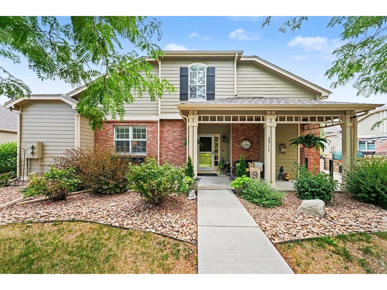 Welcome to your dream home in the highly desirable Harvest Park subdivision! This meticulously maintained and beautifully updated end-unit offers the ultimate in main-floor living, boasting an expansive 2,950 square feet of thoughtful design. As you step inside, you are greeted by an airy open floor plan accentuated by gorgeous hardwood floors throughout. The inviting living area serves as the heart of the home, featuring a custom entertainment wall with built-in bookshelves and elegant, high-end shutters. Culinary enthusiasts will fall in love with the gourmet kitchen, which shines with premium granite countertops, a classic apron sink, and seamless flow for entertaining. The luxurious main-floor master suite is a private oasis, complete with a spa-like 5-piece bath. Convenience is key with a main-floor laundry room and an attached 2-car garage equipped with central air to keep you comfortable year-round. Upstairs, you will find a second spacious, versatile loft perfect for a dedicated home office or media room. Need more space? The expansive unfinished basement features a handy .25 bath, offering a blank canvas for your future expansion or massive storage needs. Step outside onto your extended patio to enjoy the serene privacy that only an end-unit can provide, surrounded by lush vegetation and open space. As part of the vibrant Harvest Park community, you'll enjoy unparalleled amenities including a premier clubhouse, pool, tennis courts, an exercise room, and miles of scenic walking trails, and a along a peaceful neighborhood creek. Best of all, this property comes with No Metro Tax, saving you thousands! Agents Note: please allow extra time to tour the amenities and return FOB to kitchen island. Don't miss this rare gem! Agent is providing a comprehensive HOA Summary Report. See docs tab for information on The Southeast Community Center coming soon and the exciting amenities.