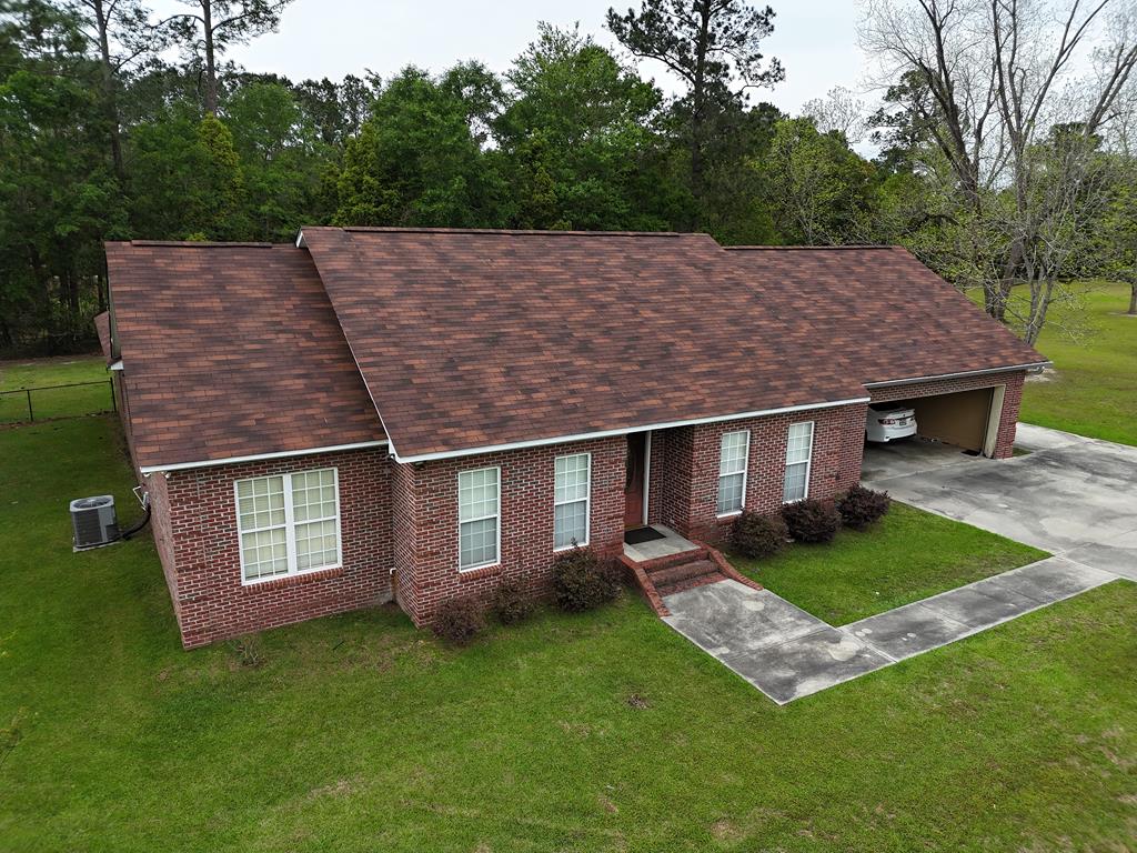 Wonderful BRICK HOME in the heart of Coolidge, GA! The layout of this 4BR/3.5 bath home is amazing! Huge central living room with formal dining area, great kitchen and nice breakfast nook. The primary suite features a nice walk-in closet and HUGE bathroom with luxury tub. On the other end of the house there is another big bedroom with its own bath that can be used for a second primary suite. Nice fenced backyard, 2-car garage, all in a nice neighborhood. Call your favorite agent TODAY for a closer look! Click here for a virtual tour: https://my.matterport.com/show/?m=FBHom1LzVkB&mls=1