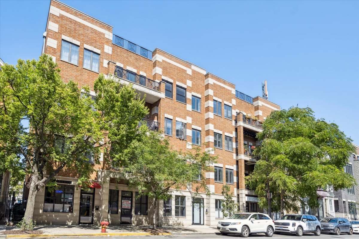 Incredible opportunity to live in this stunning 3 bed 2 bath in the heart of Roscoe Village.  Located in an elevator building this unit is filled with natural light and set on the north side of the building (off of Belmont).  Upon entry you are greeted with updated chefs kitchen with SS appliances, 42" cabinets and stone counters.  Kitchen is open to large dining and living area- perfect for entertaining.  Dining area offers plenty of room for a full dining set and the living room features a fire place and access to your private balcony- perfect for grilling.  Directly off of the living room are two spacious bedrooms and updated second bathroom.  Extra large primary suite completes the unit.  Primary bedroom includes HUGE 6'X9' walk in closet and spa caliber bath with double vanity, separate soak tub and glass shower. One exterior parking space and storage closet on ground level is included.  A++ location, walk to shops, restaurants, parks and public transit right outside your door!