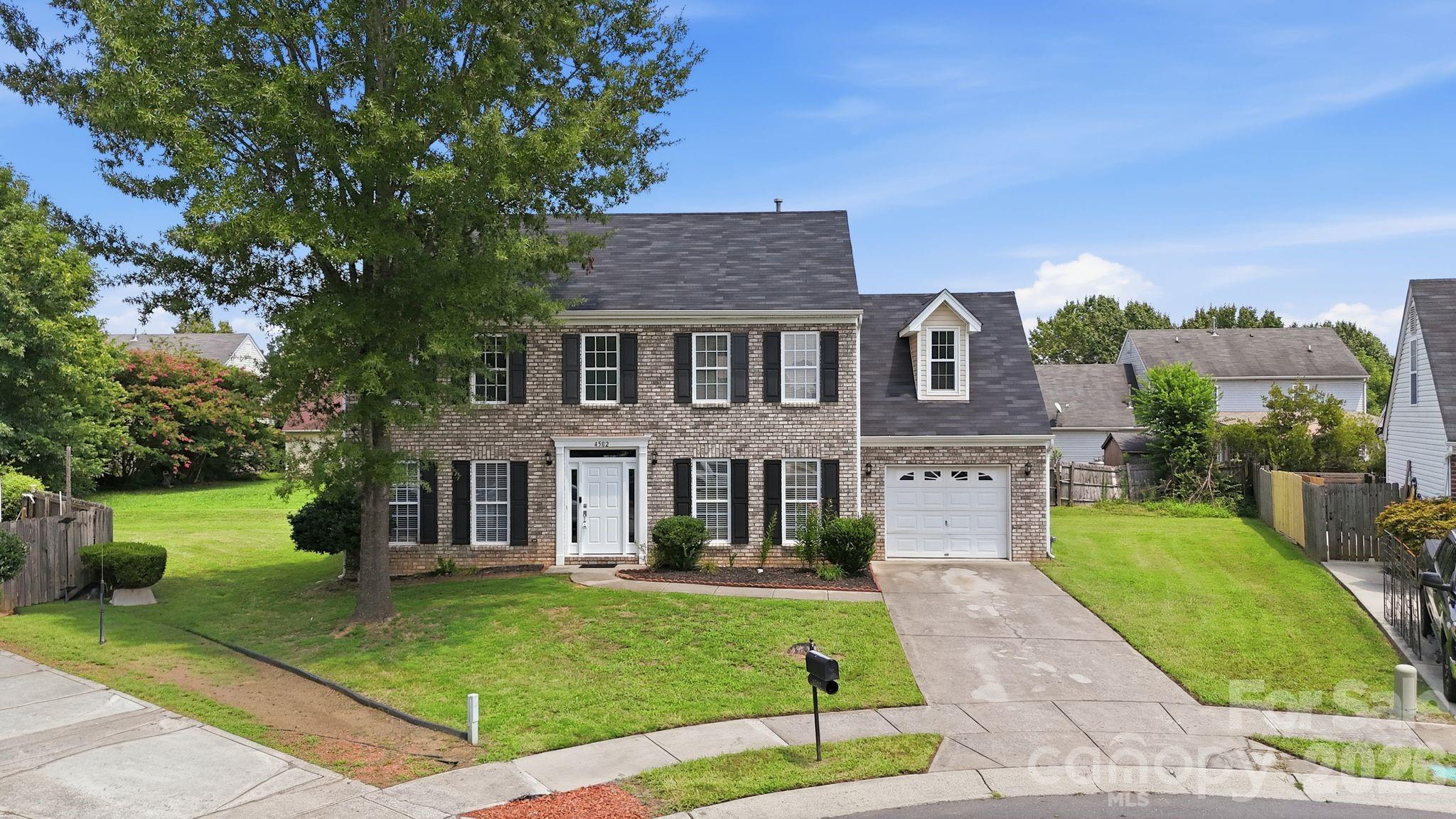 Welcome home to this well-maintained traditional two-story home nestled on a quiet cul-de-sac in the highly desirable Steele Creek area! Offering 2,118 square feet, this 4-bedroom, 2.5-bath home provides a flexible floor plan with the spacious fourth bedroom over the garage easily serving as a bonus room, media room, or home office. The inviting interior features engineered hardwood flooring throughout the main level, upgraded granite countertops, stainless steel appliances, and an open, functional layout that's perfect for both everyday living and entertaining.Retreat to the spacious primary suite, complete with a cozy sitting area that offers the perfect space for a reading nook, home office, nursery, or exercise area. The en-suite bath features a relaxing garden tub, creating a private retreat at the end of the day.The attractive brick front elevation adds excellent curb appeal, while the vinyl siding on the sides and rear offers easy maintenance. Situated on a generous 0.24-acre lot, the backyard provides plenty of room for outdoor activities, entertaining, pets, or future enhancements. The oversized one-car garage (approximately 320 square feet) offers additional storage and workspace.Located in a sought-after community with low HOA dues, this home offers convenient access to shopping, dining, schools, I-485, Premium Outlets, Charlotte Douglas International Airport, and Uptown Charlotte. A fantastic opportunity for buyers seeking space, value, and an excellent location. Bring your buyers and make this their new home!