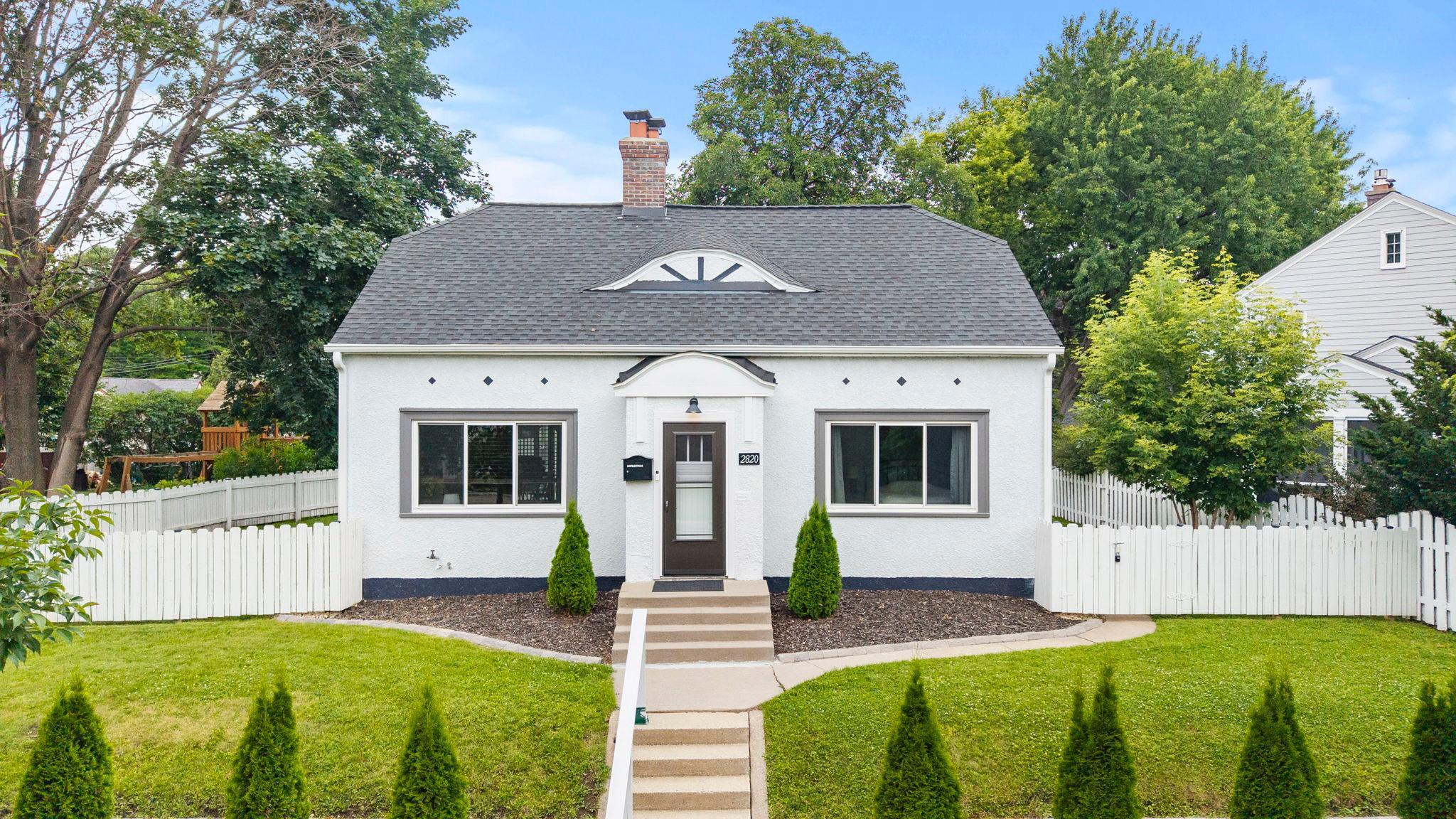 Perfectly positioned near Northeast Middle School, neighborhood parks, and Gross National Golf Club, this move-in ready 1.5-story home blends timeless charm with impressive modern updates.Refinished hardwood floors, a classic brick wood-burning fireplace, main-level bedroom and full bathroom, and a beautifully updated kitchen featuring newer appliances, soft-close cabinetry, pull-out shelving, a peninsula, and breakfast bar come together to create warm, comfortable everyday living.The refreshed upper-level loft with 9-ft ceilings, LVP flooring, and a high-efficiency mini split offers flexible space for a primary suite, office, or family room.Relax in the insulated three-season porch or enjoy the fully fenced backyard with a spacious deck. The extra-deep garage features built-in shelving, myQ smart opener, EV charger compatibility, and a new driveway (2022).Major improvements include roof, gutters, LeafGuard, windows, drain tile, sump pump, water heater, whole-home water filtration, and fiber internet for true peace of mind.